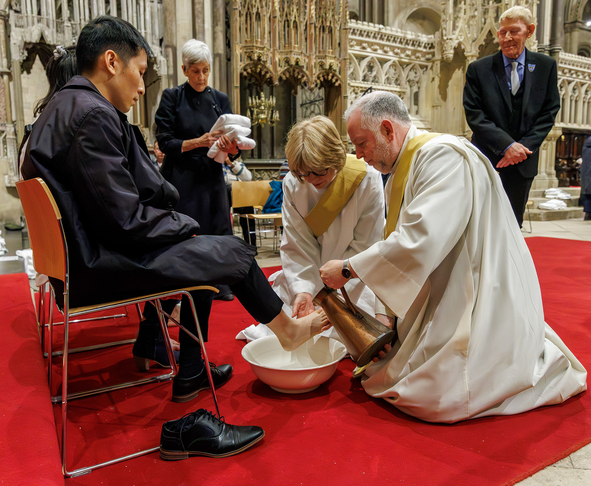 The Archbishop of Canterbury and the Dean of Canterbury wash feet on Maundy Thursday
