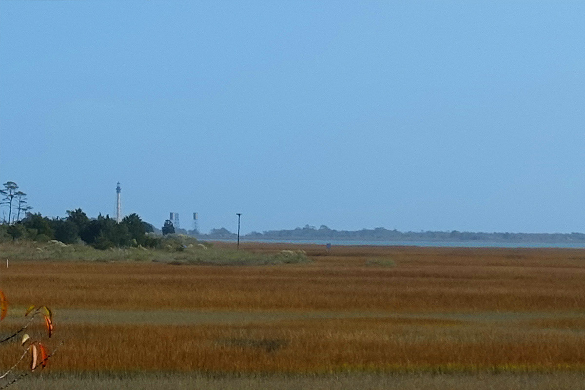 Cape Charles Lighthouse • Chesapeake Bay, VA - WWII Winslow Battery fire control towers to the right of the lighthouse.