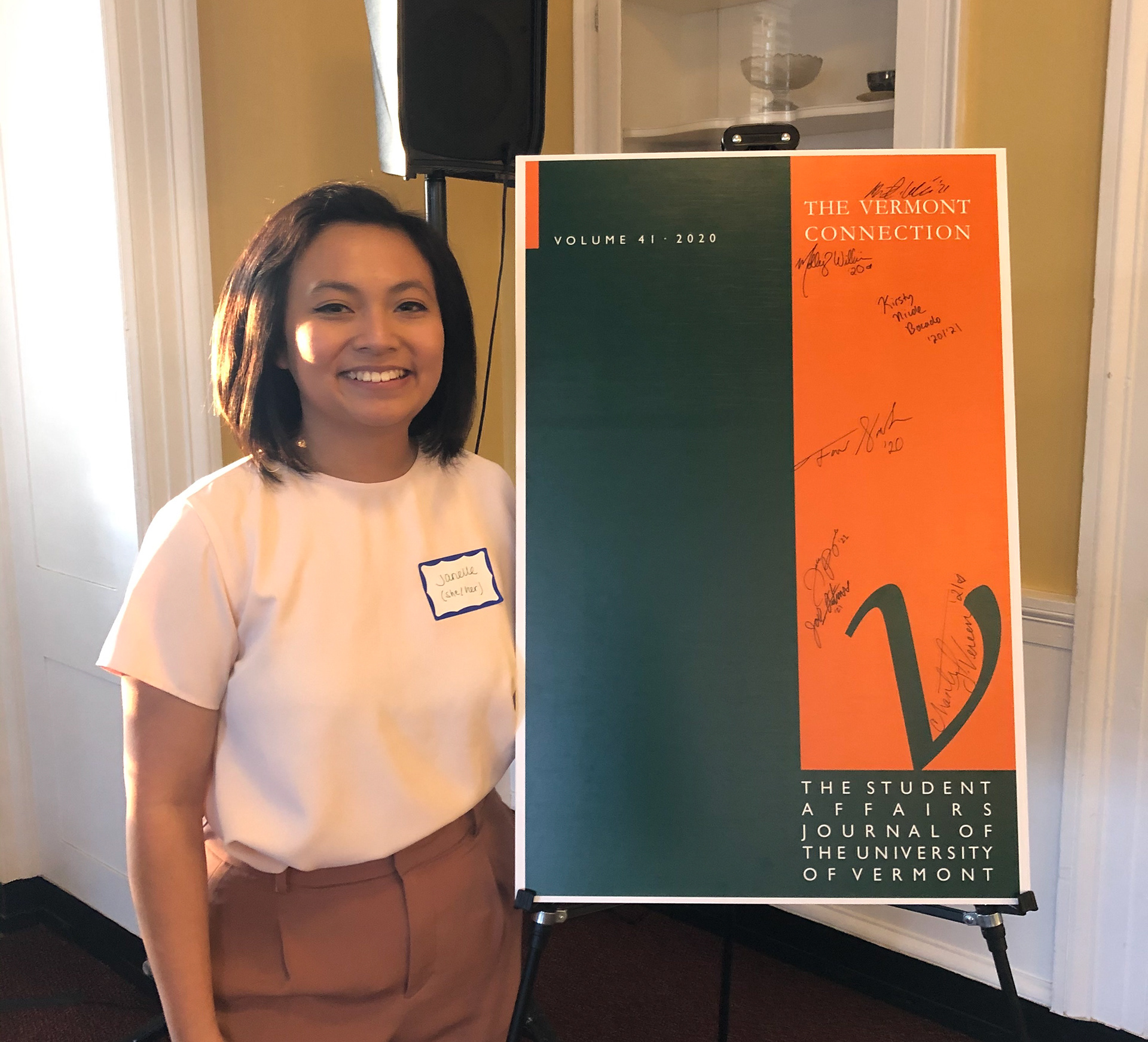 A photo of me during the premiere of The Vermont Connection student affairs journal. This was my first published article as a grad student!