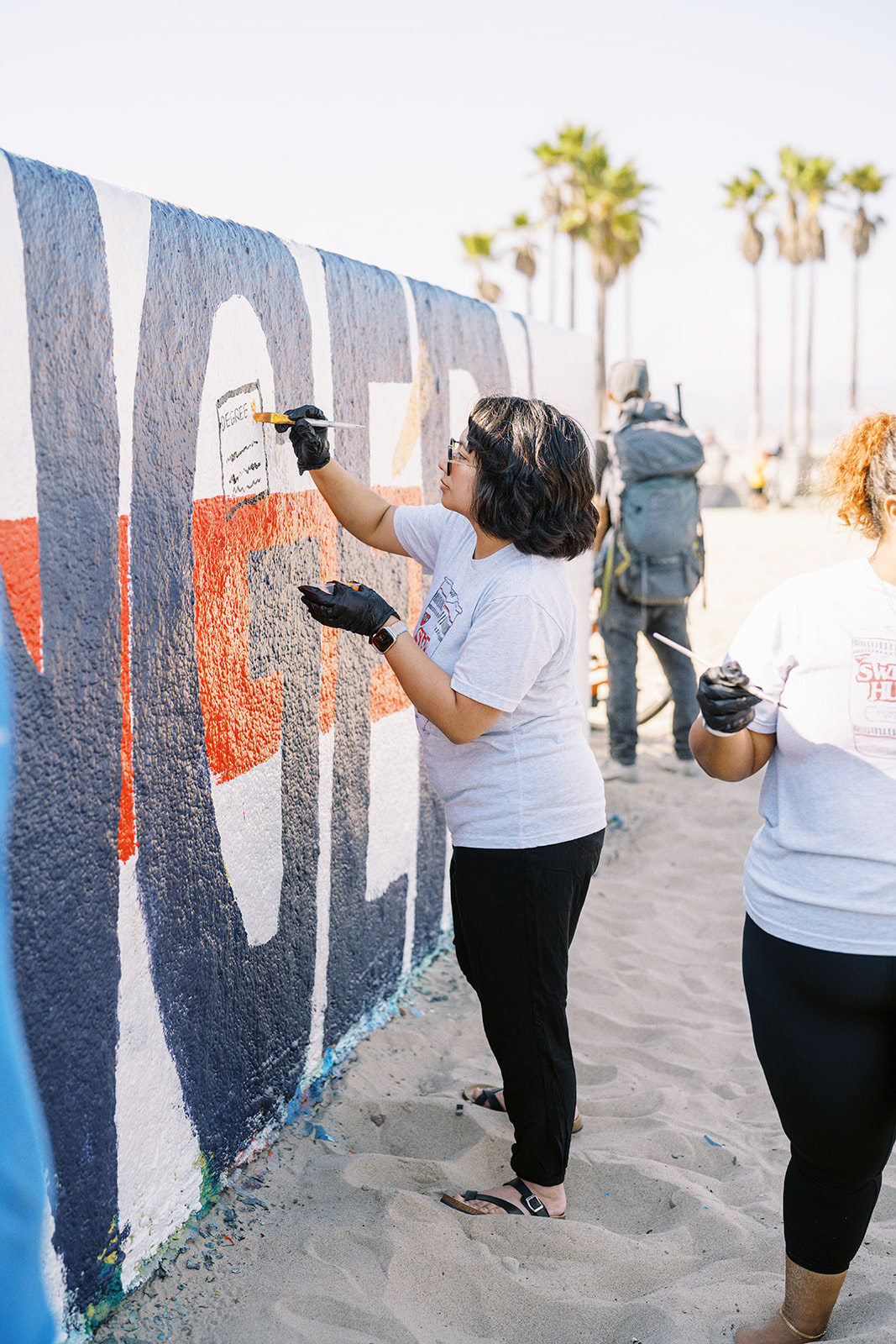 We painted a mural on the beach as part of our team bonding activity!
