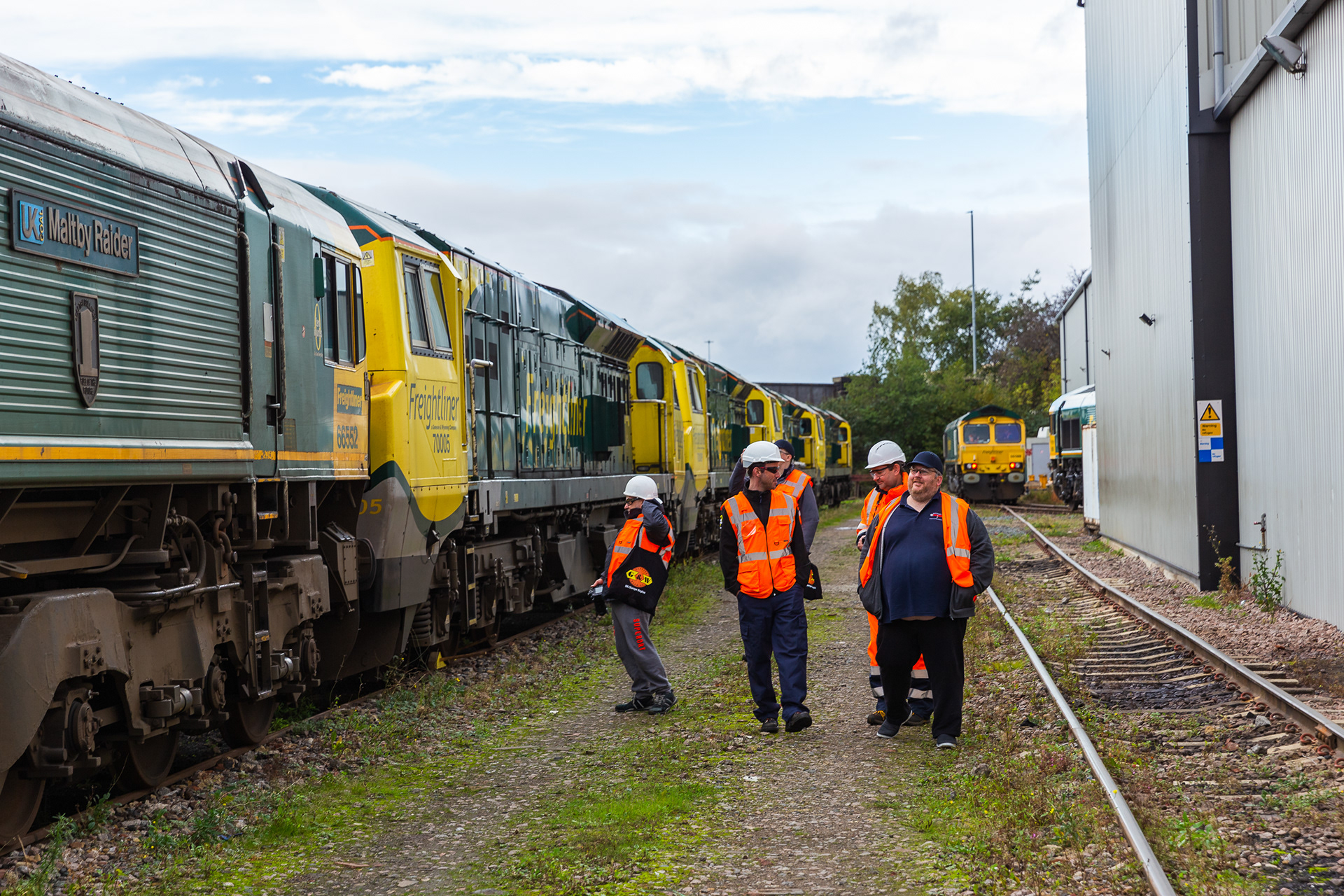 Rail Riders Crew looking at the locos