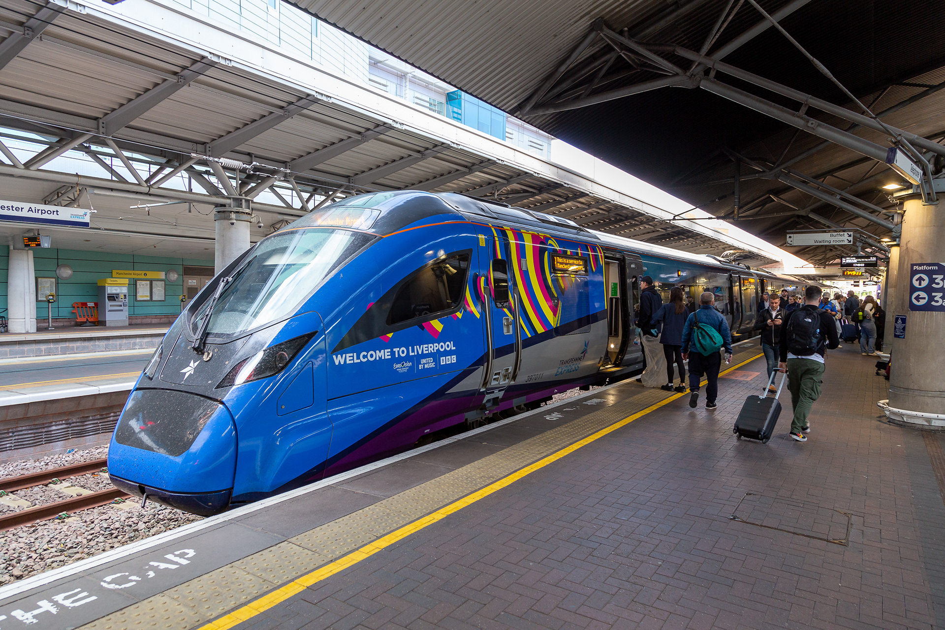 Transpennine Express 397011 Eurovision livery at Manchester Airport