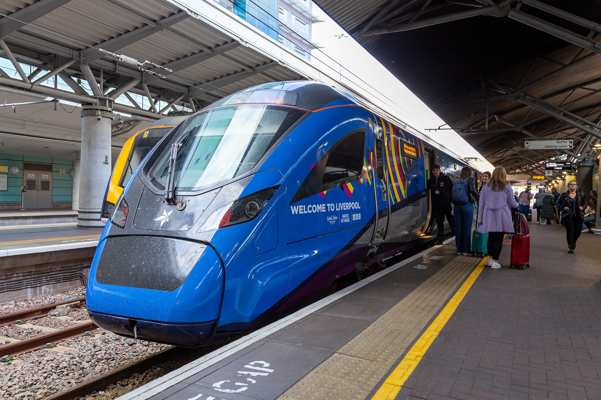 Transpennine Express 397011 Eurovision livery at Manchester Airport