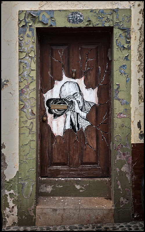 One of many painted doorways in the Rua de Santa Maria, Funchal, Madeira.