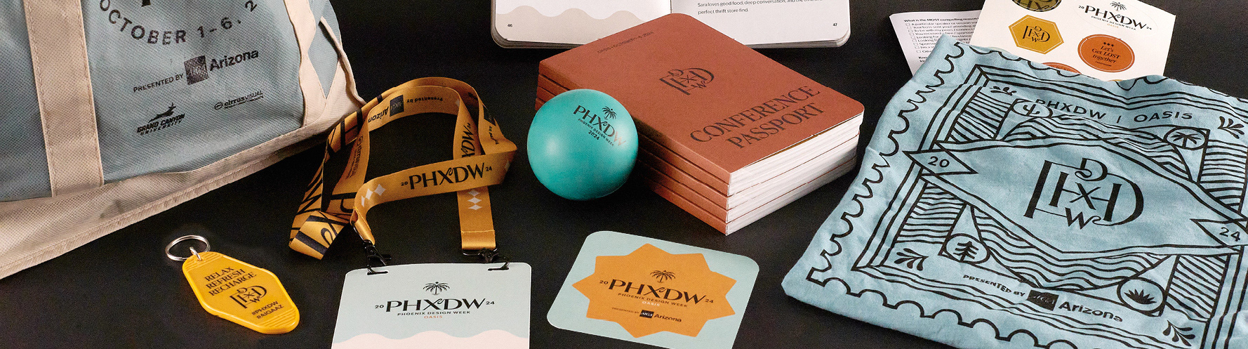 Photo of Phoenix Design Week 2024 conference materials and swag