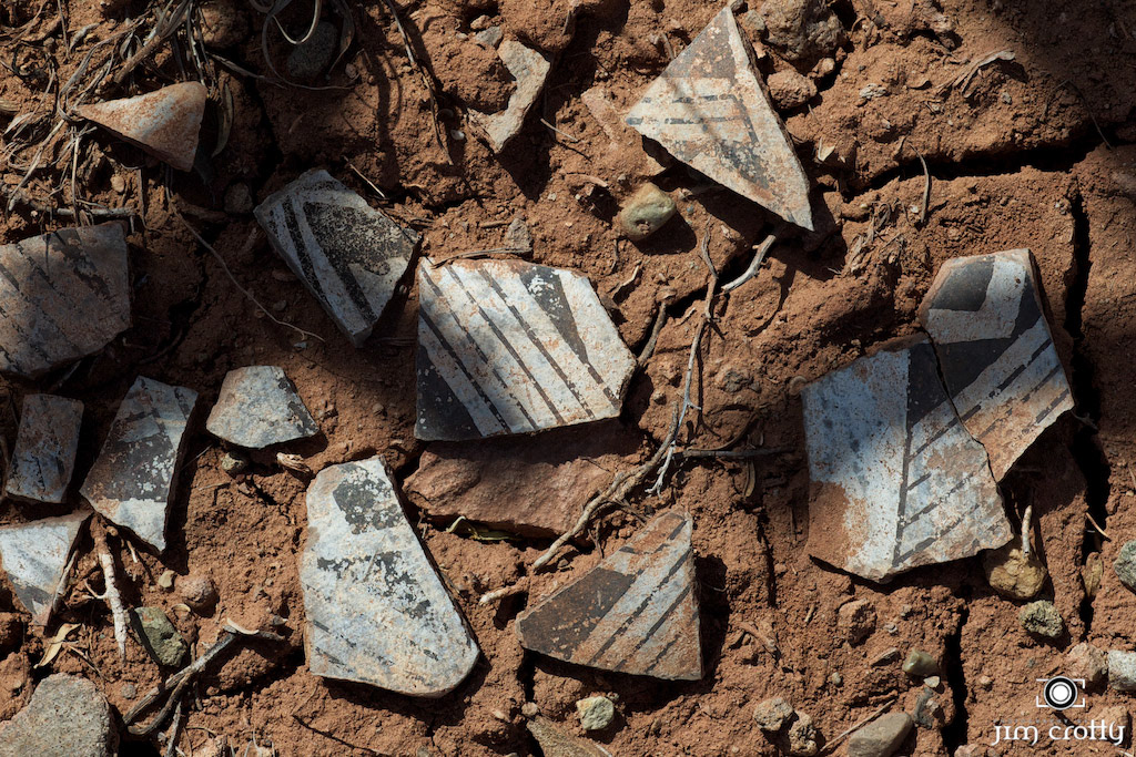 Fragments of pottery near archealogical site near Sandia Mountains of New Mexico from Pueblo culture