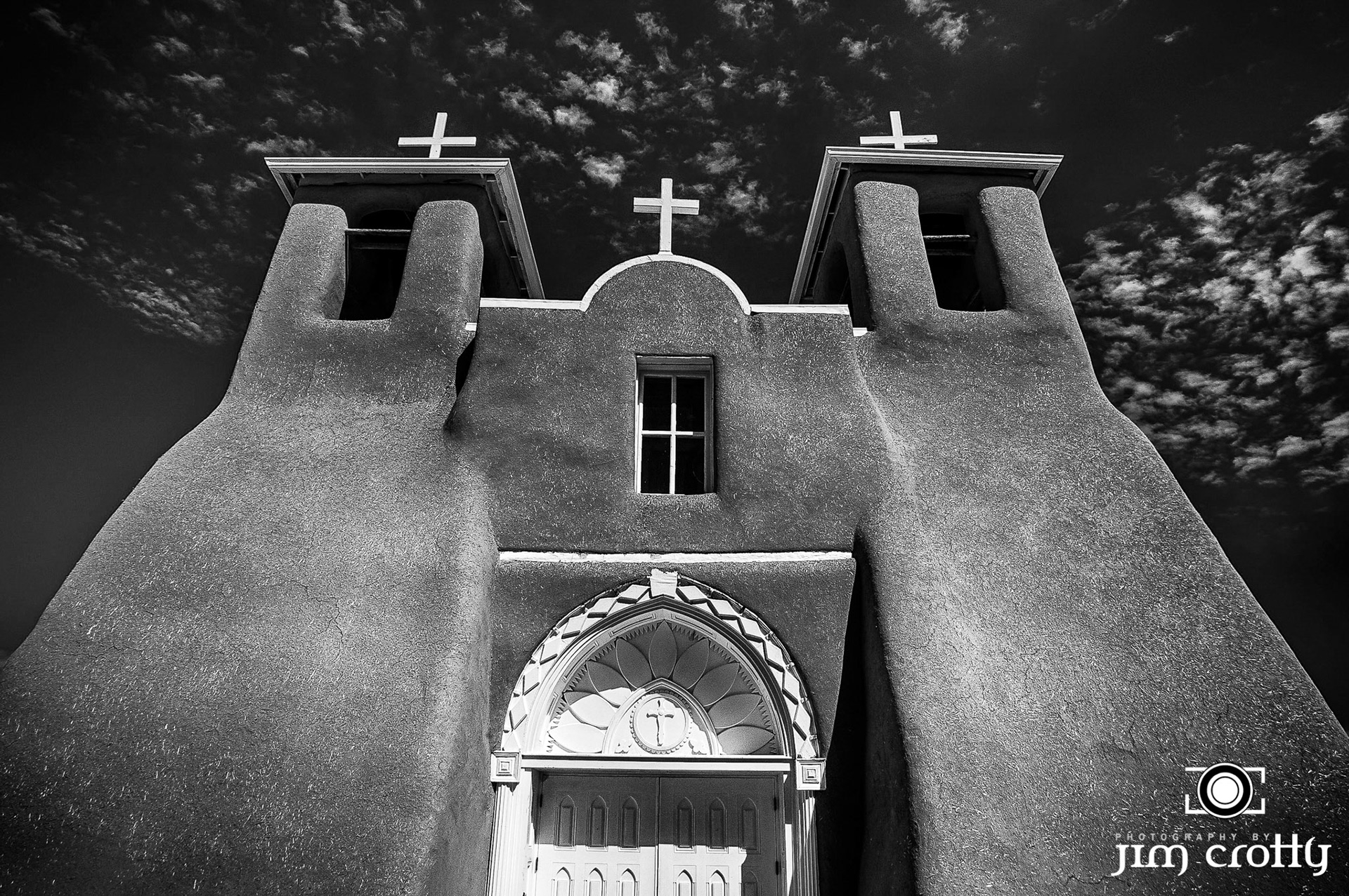 St. Francisco de Asis Catholic Church in Taos New Mexico by Jim Crotty