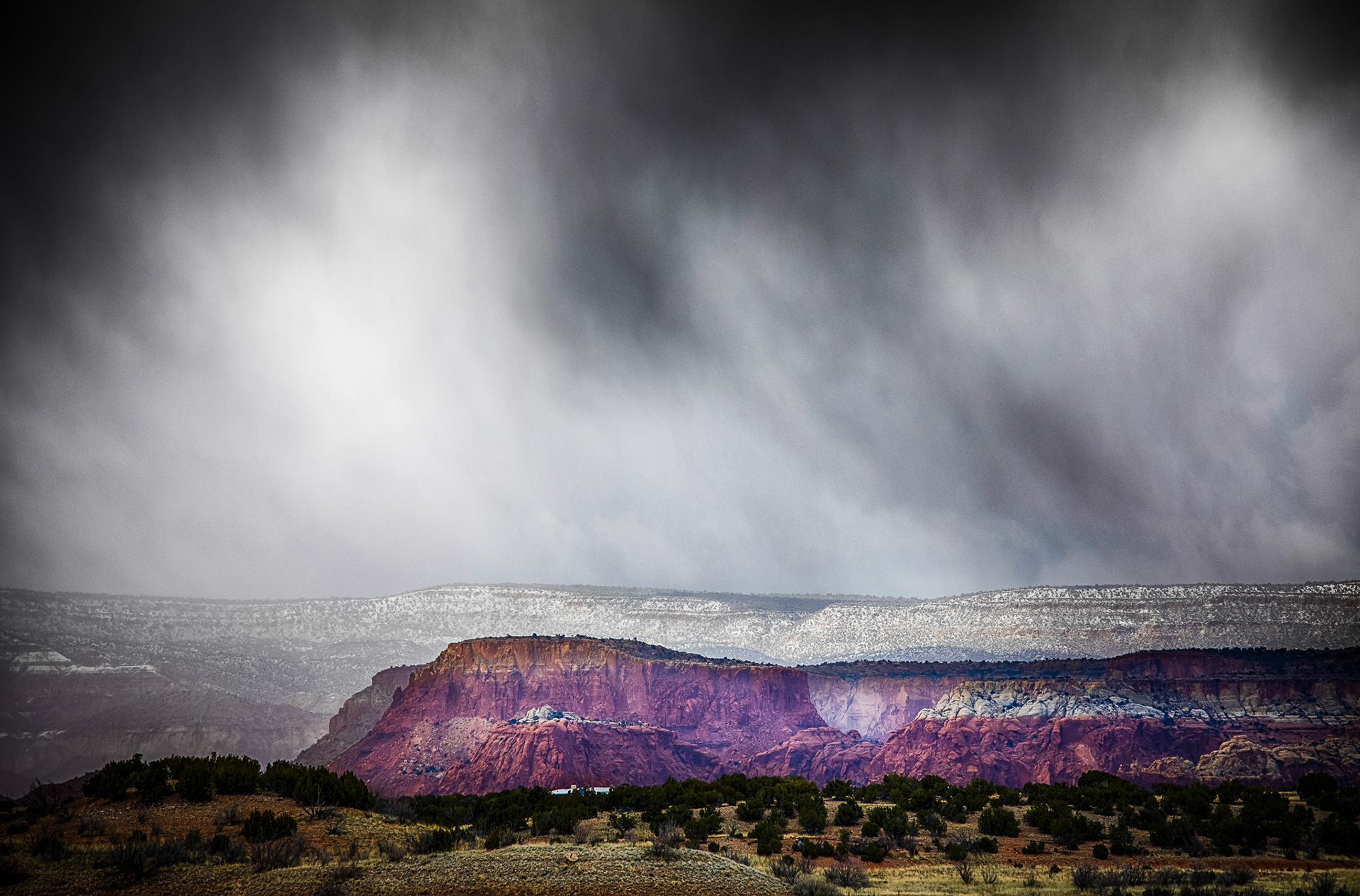 Passing storm over Abiquiu Lake in New Mexico by Jim Crotty