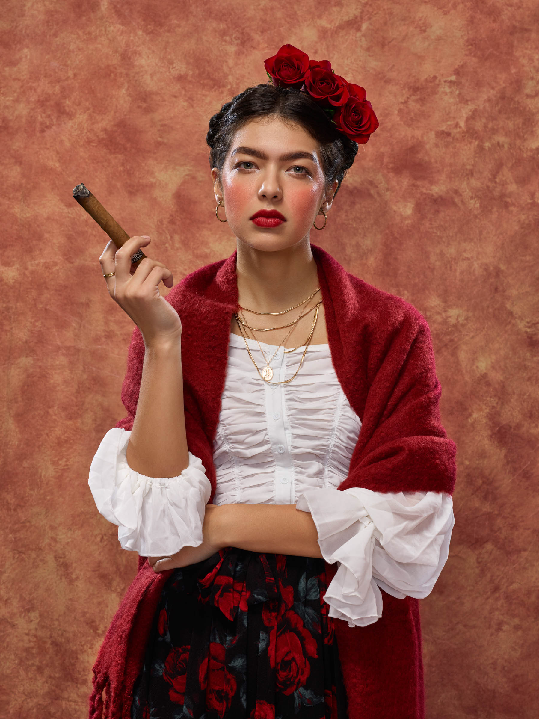 Frida Kahlo inspired portrait with woman holding cigar and intense direct gaze