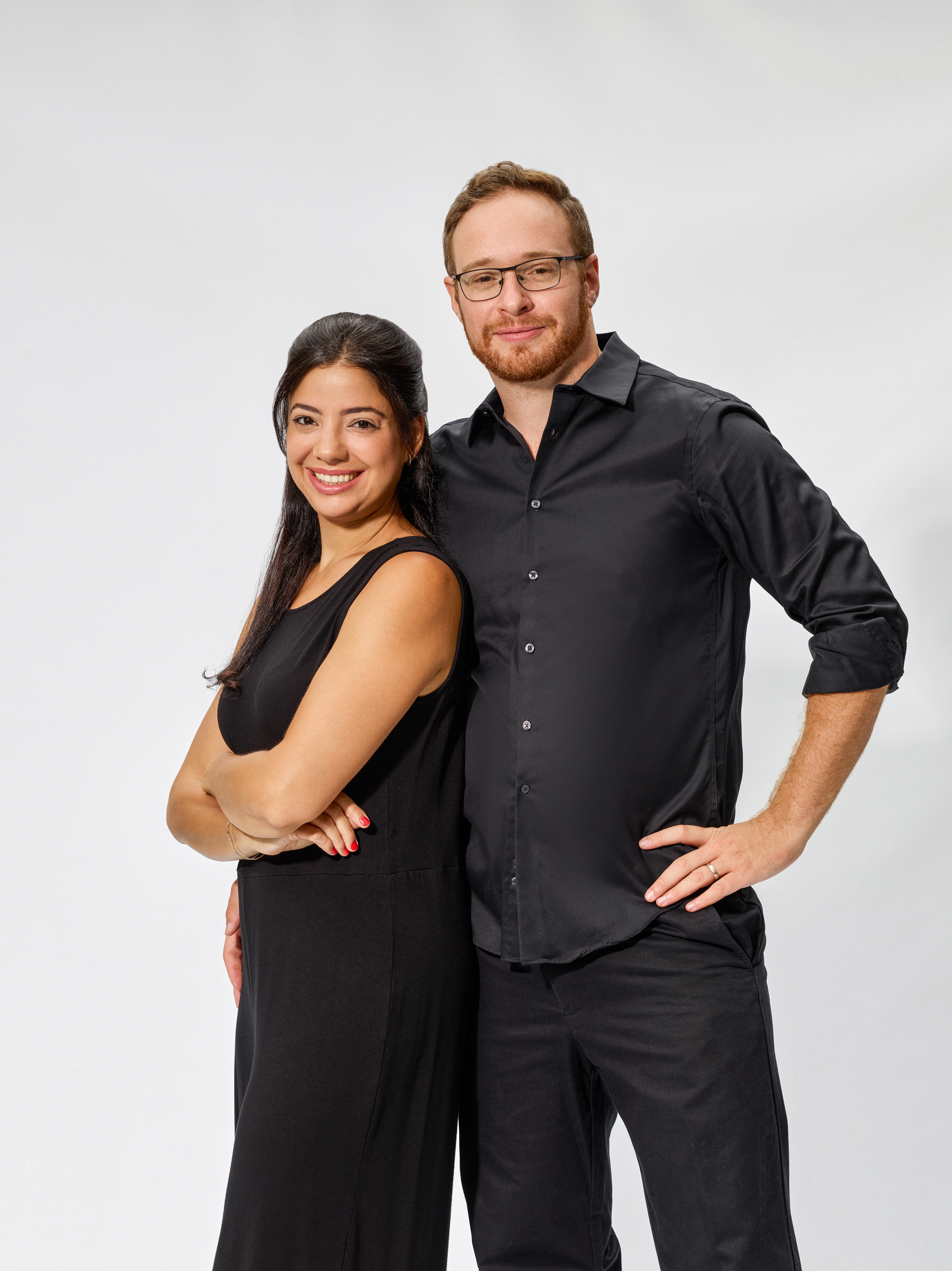 Approachable professional portrait photographed with soft studio lighting.