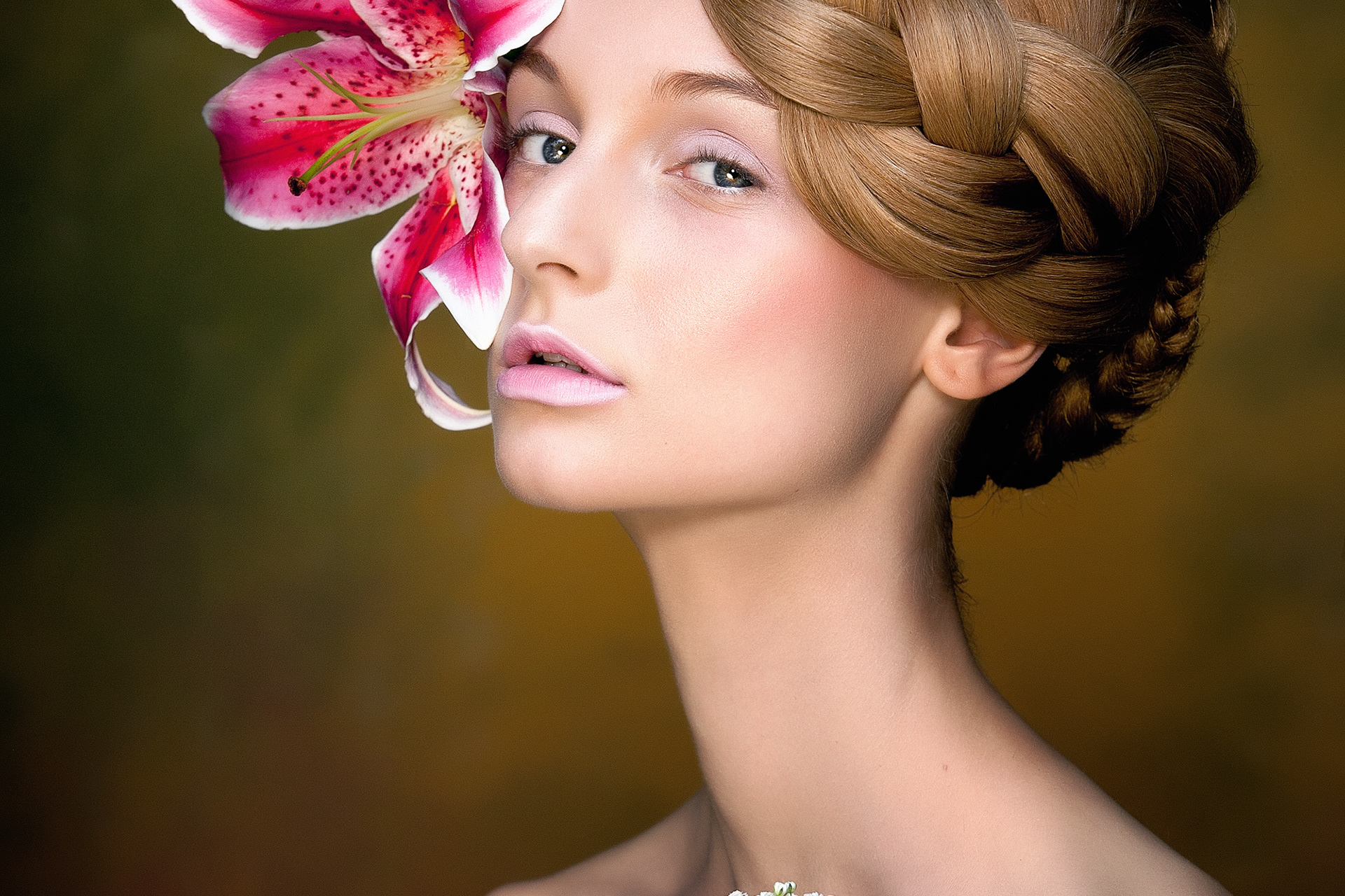 Editorial-style portrait photographed with classic beauty lighting.