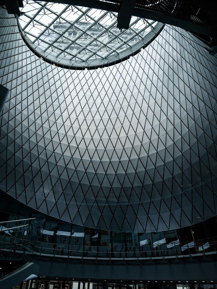 Glass and steel ceiling inside Fulton Center NYC with geometric architectural design
