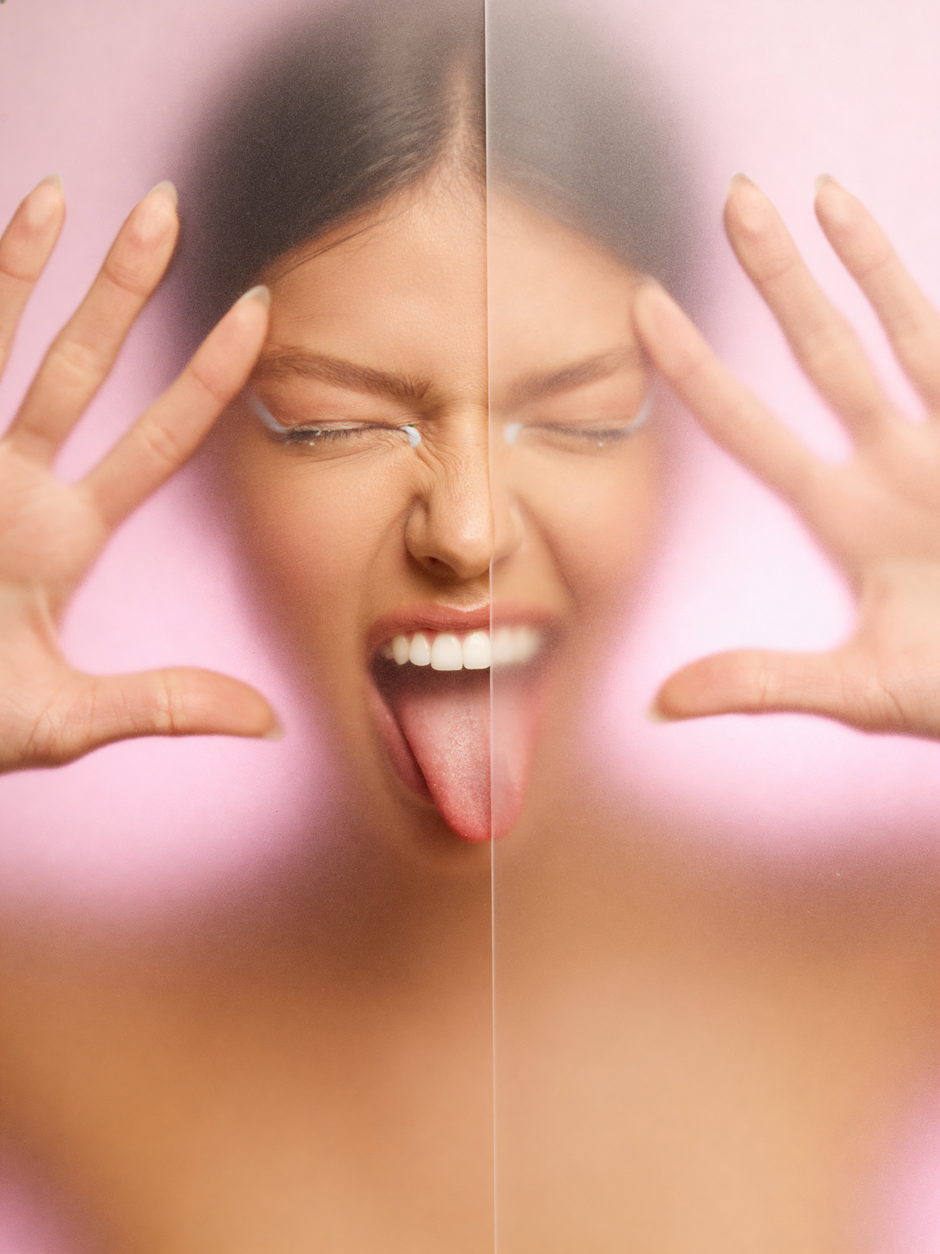 Refined studio portrait emphasizing face and expression.