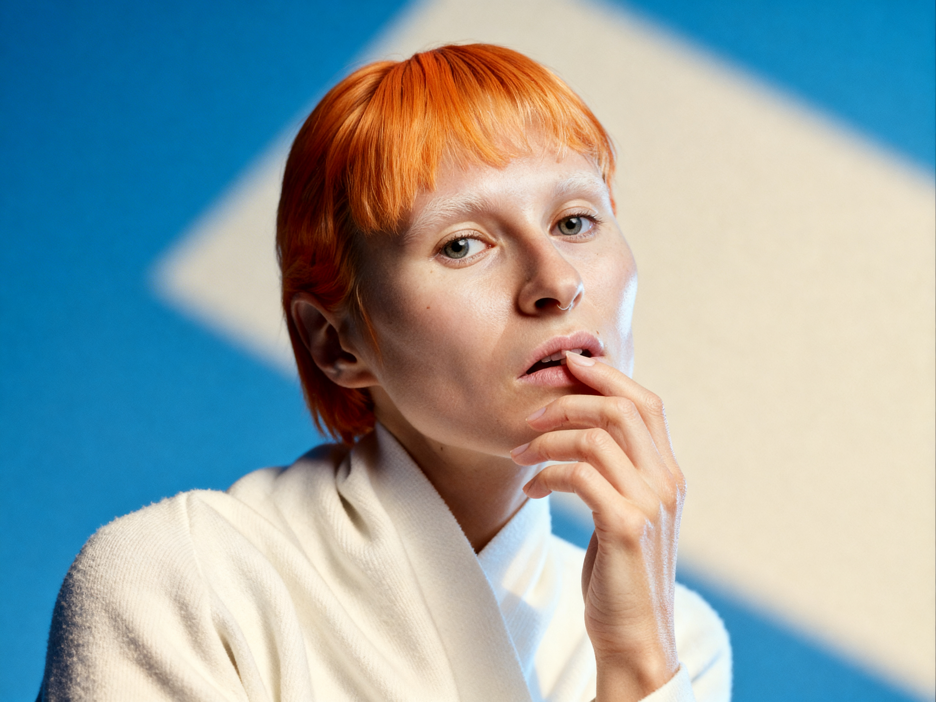 Close-up professional portrait emphasizing expression and detail.