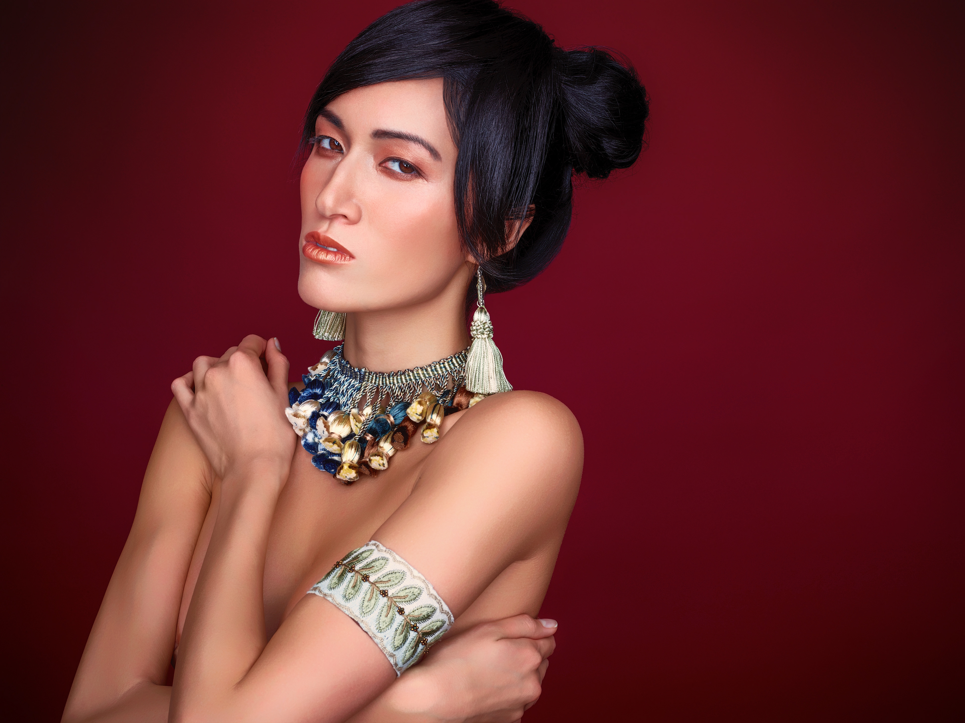 Creative fashion editorial highlighting jewelry and clothing collaboration