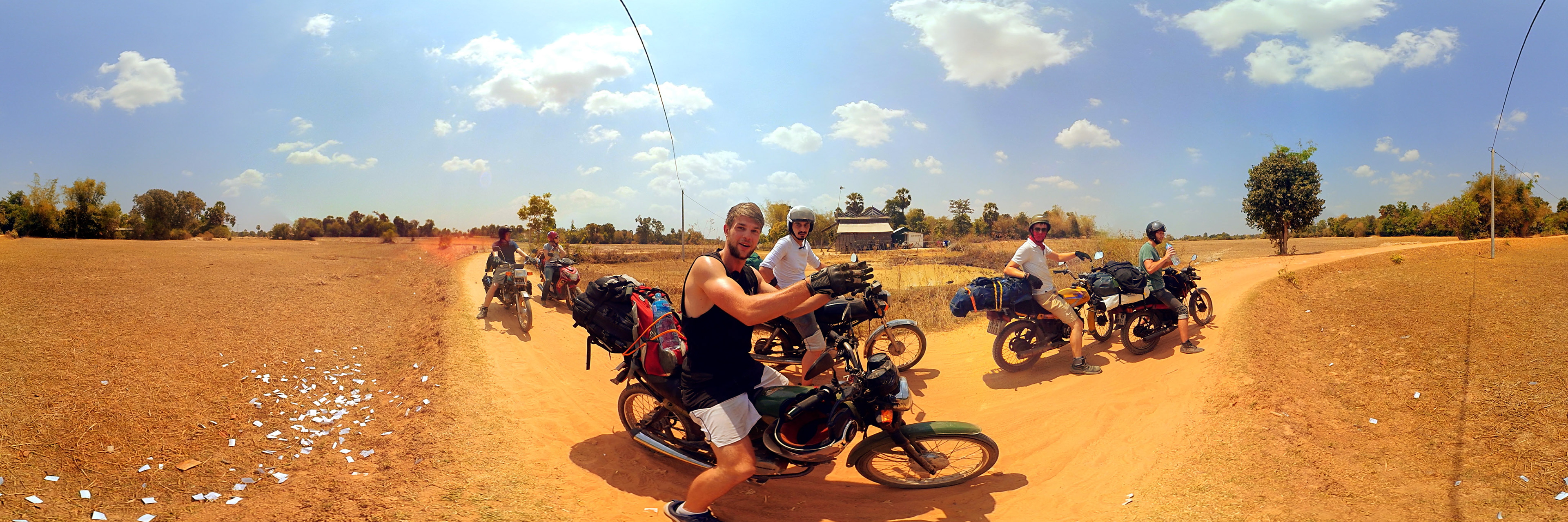 The protagonists on motorbike in the dessert