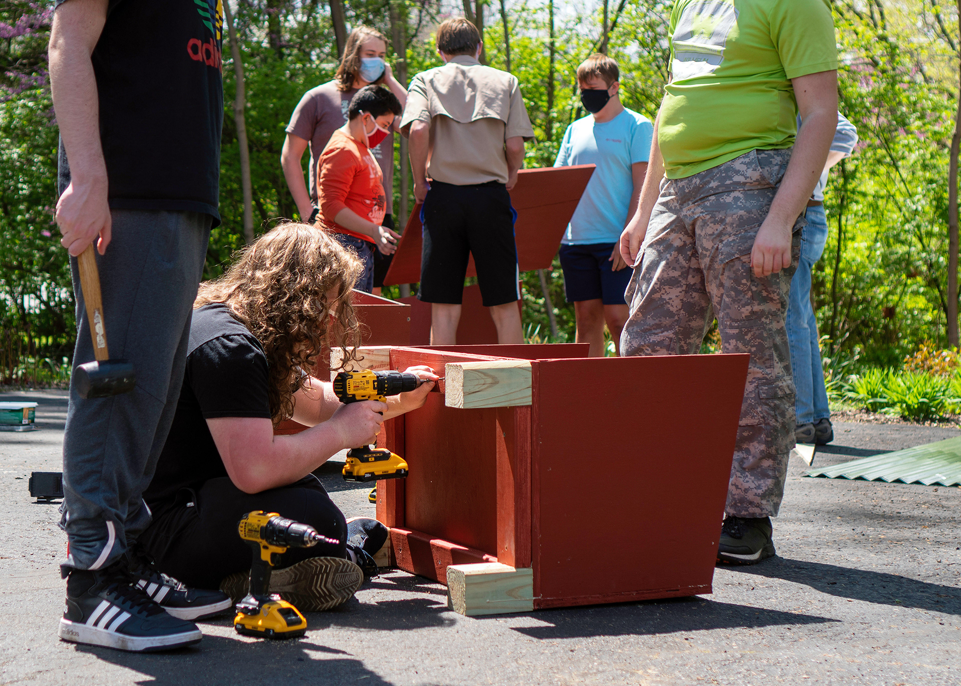 Boy Scouts in Indianapolis building winter cat shelters for community cats.