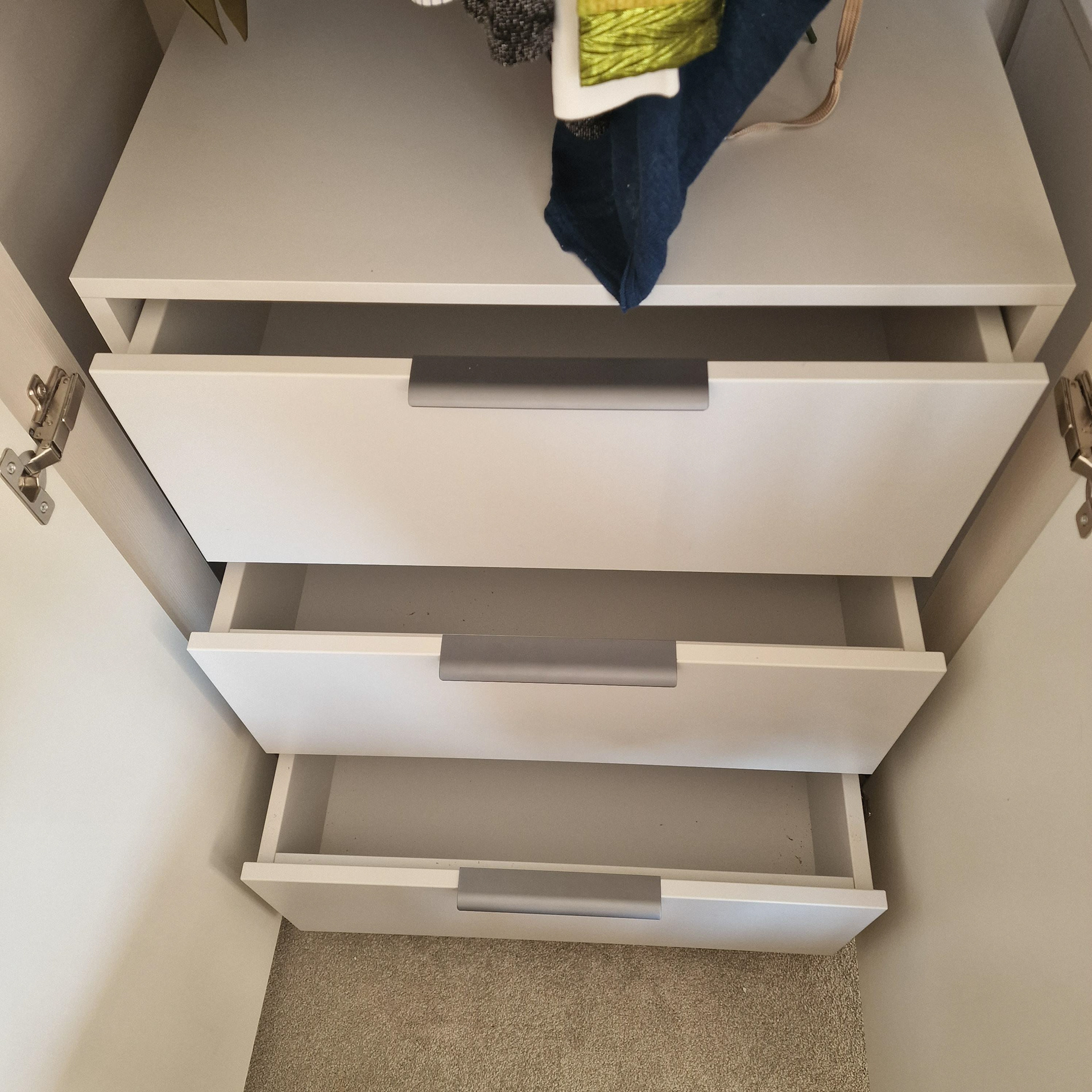 Bespoke, interior wardrobe cabinets with Blum hardware and Blumotion soft close drawers.