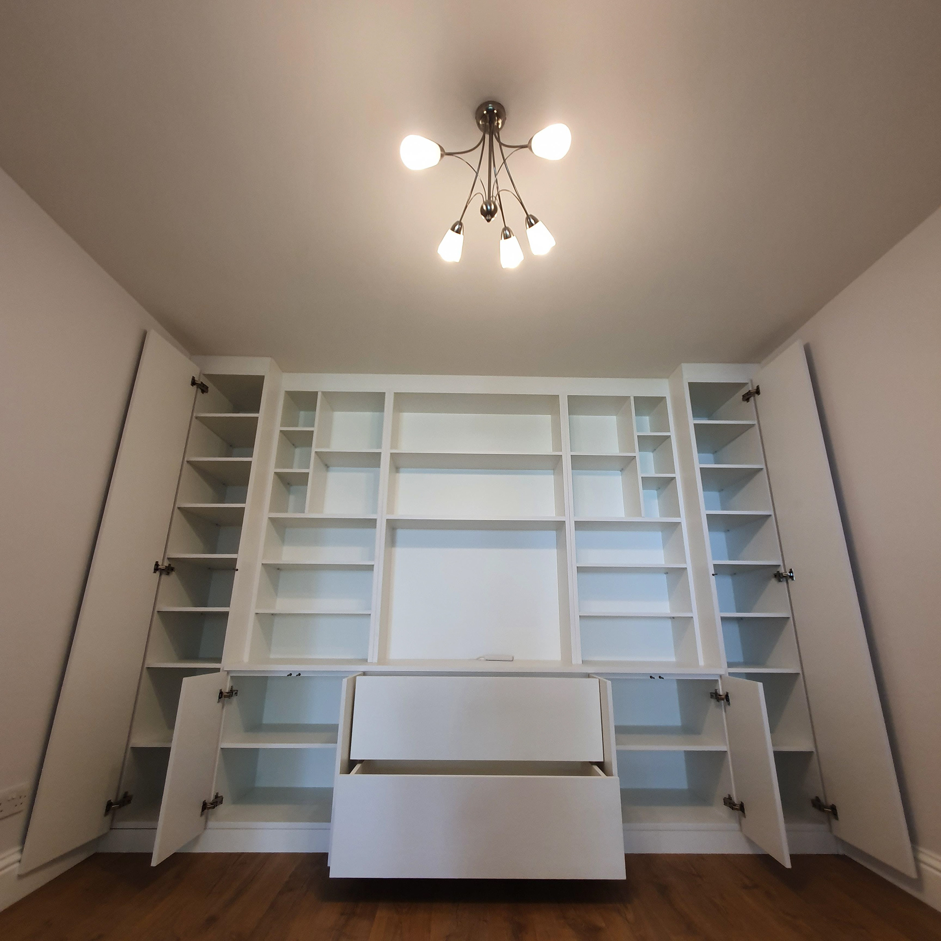 Bespoke Media unit and storage. Push to open doors and drawers with Blum Hardware and Blumotion soft close.