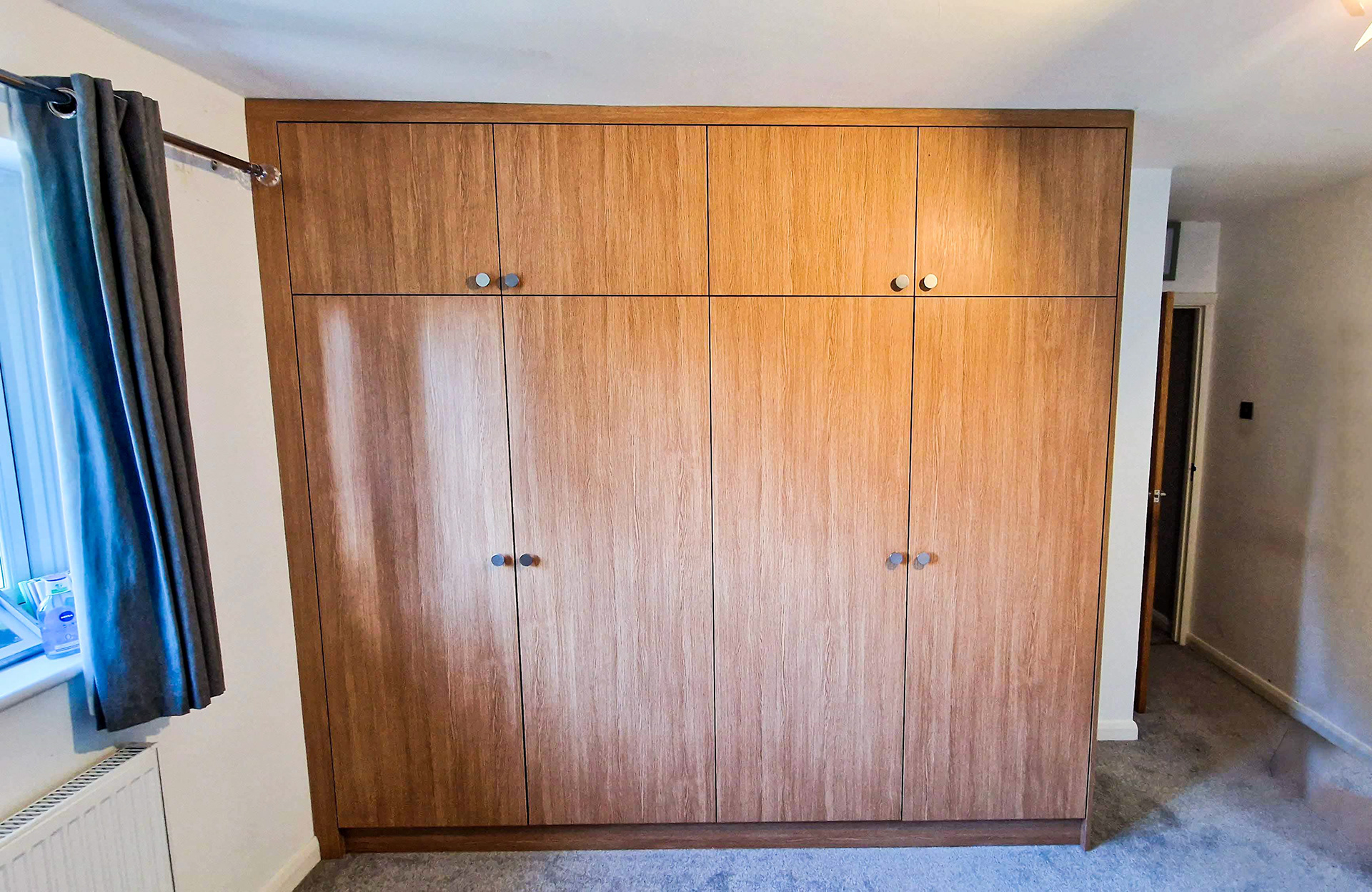 Bespoke, fitted wardrobe with big storage above, 5 deep shelf unit and internal quadruple drawer with soft close blum runners and hinges.