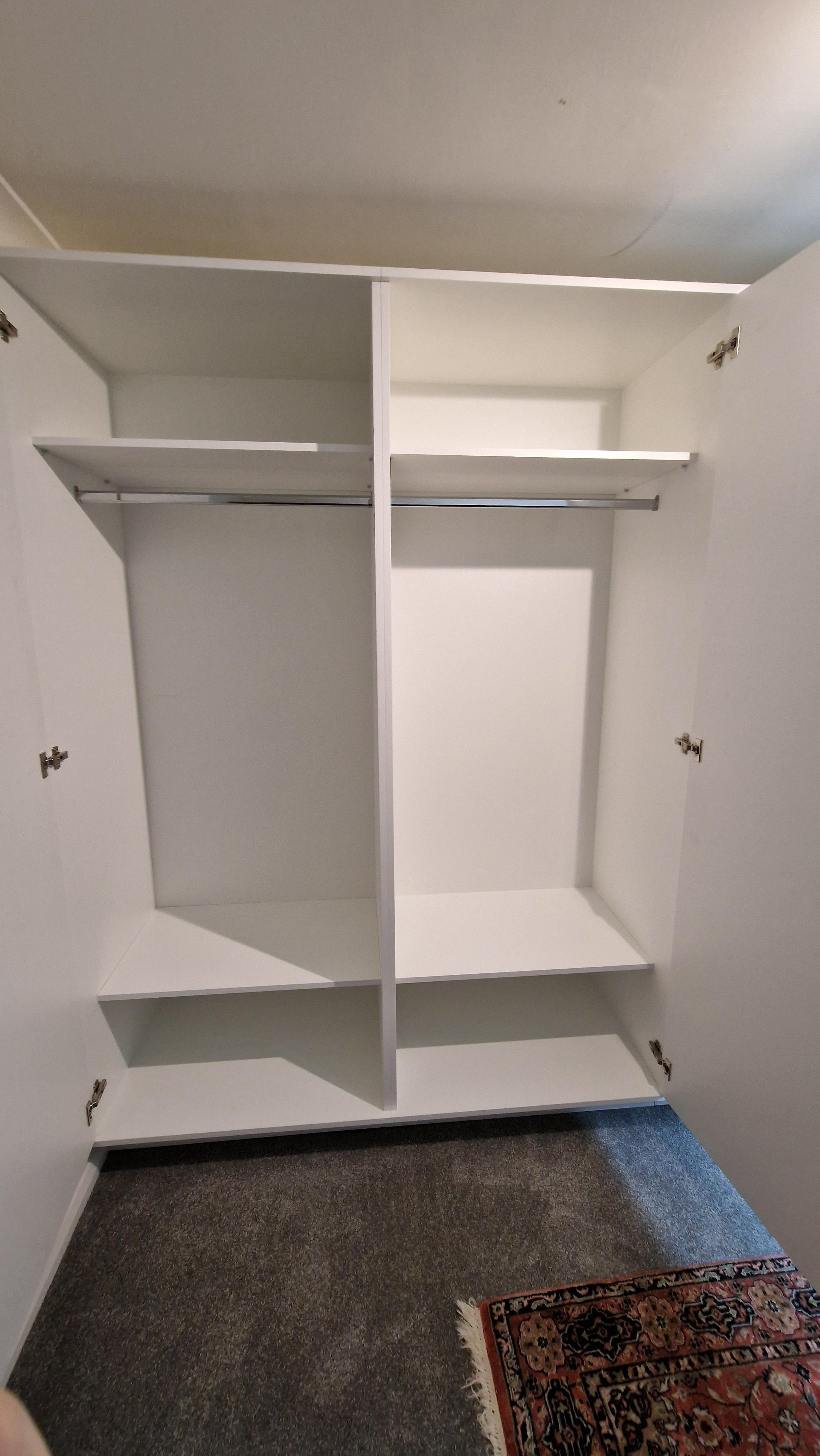 Four bespoke, fitted wardrobes with rails and two shelves. Blum hardware with Blumotion soft close.