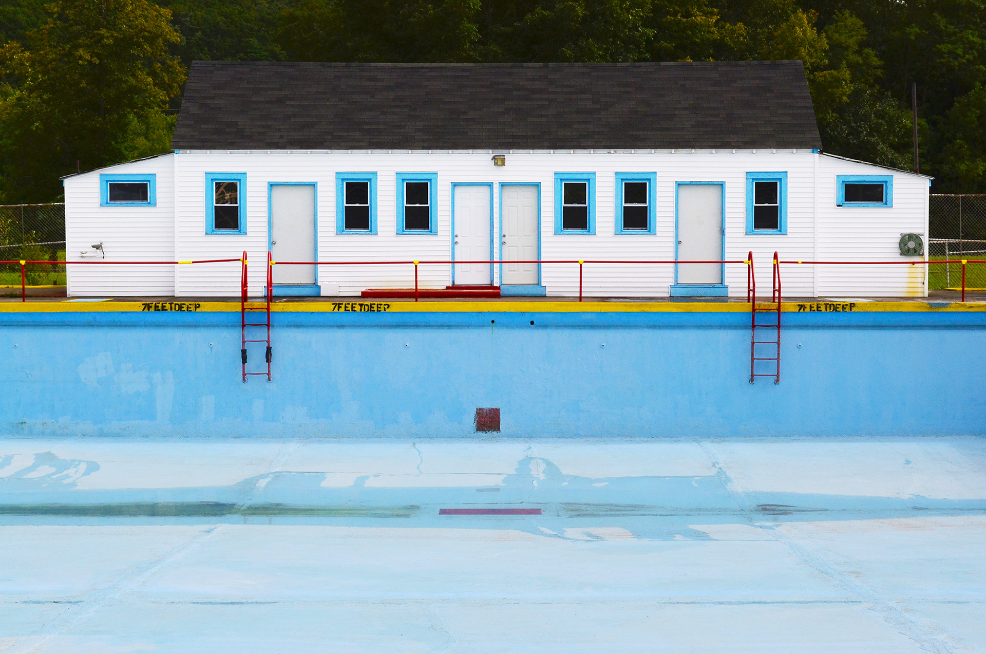 Empty Pool and Pool House in upstate NY.