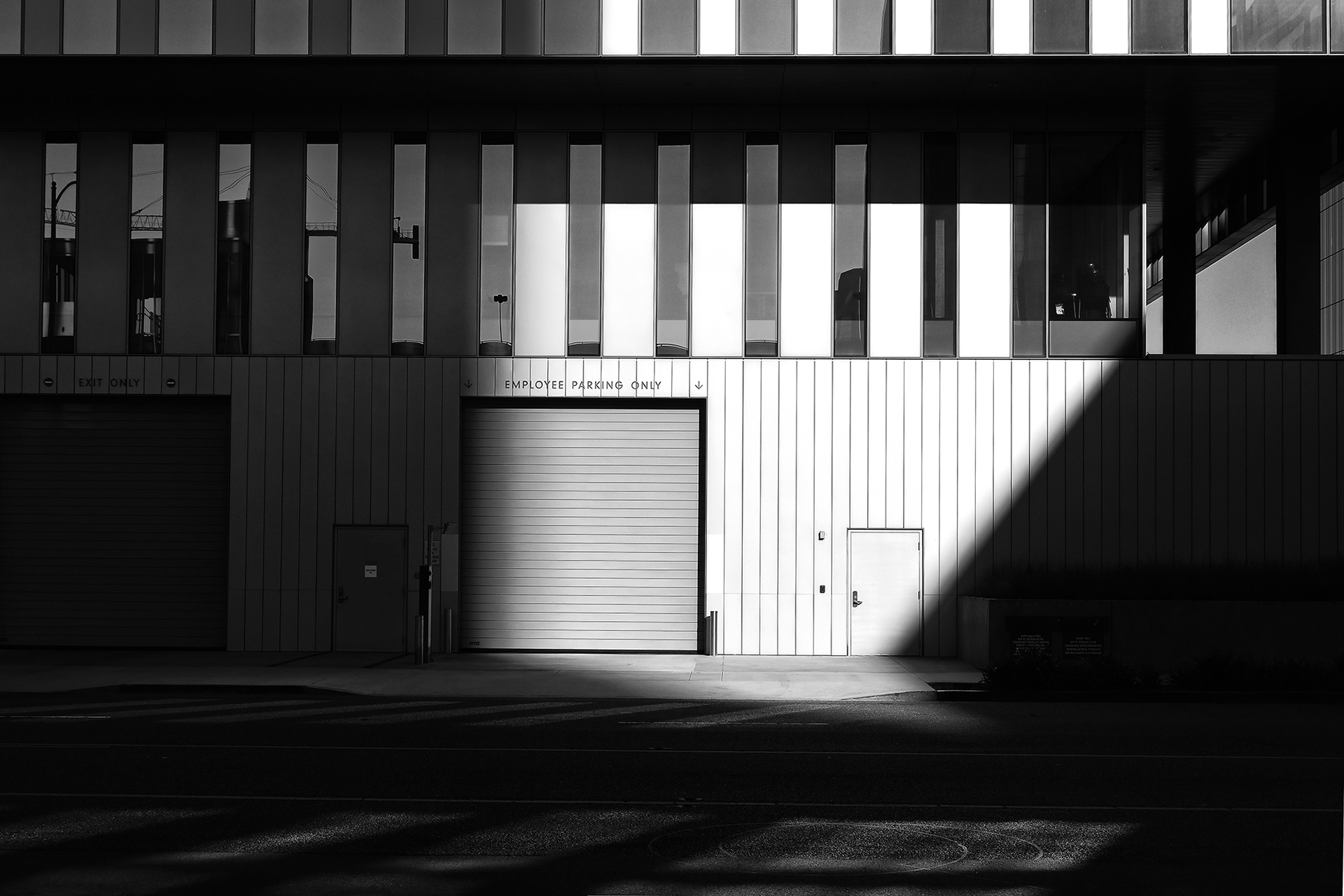 Shaft of Light, Late Afternoon, Employee Parking Only Entrance, Parking Garage, Downtown Long Beach, black and white photograph