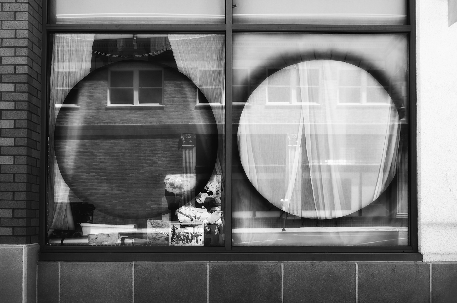 Shop Window with reflections, black and white photograph