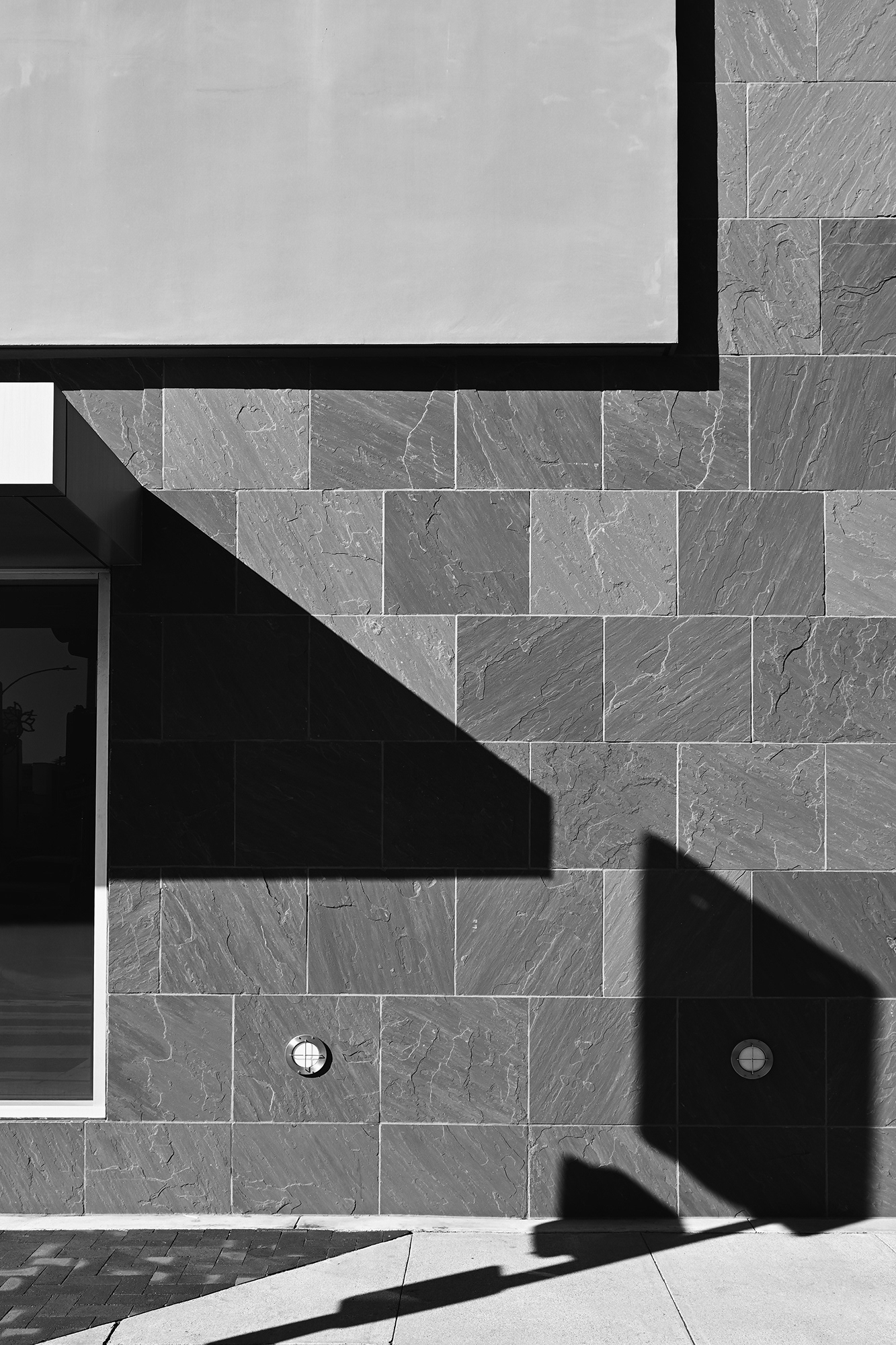 Shadows cast on a bank building, Belmont Shore, black and white photograph