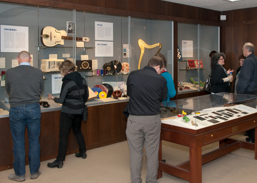People viewing the Just One Word: Plastics exhibit