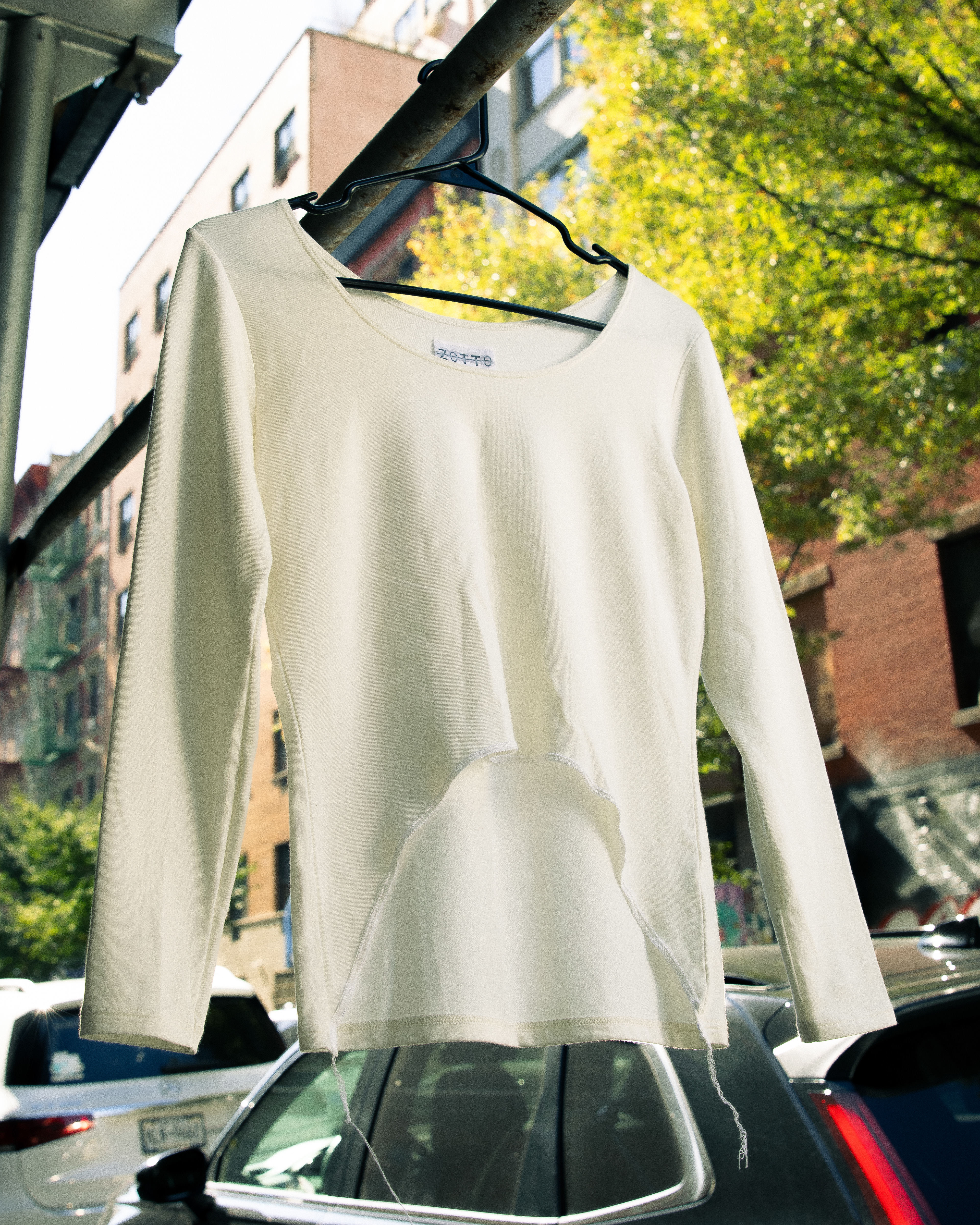 ASYMMETRICAL LONG SLEEVE