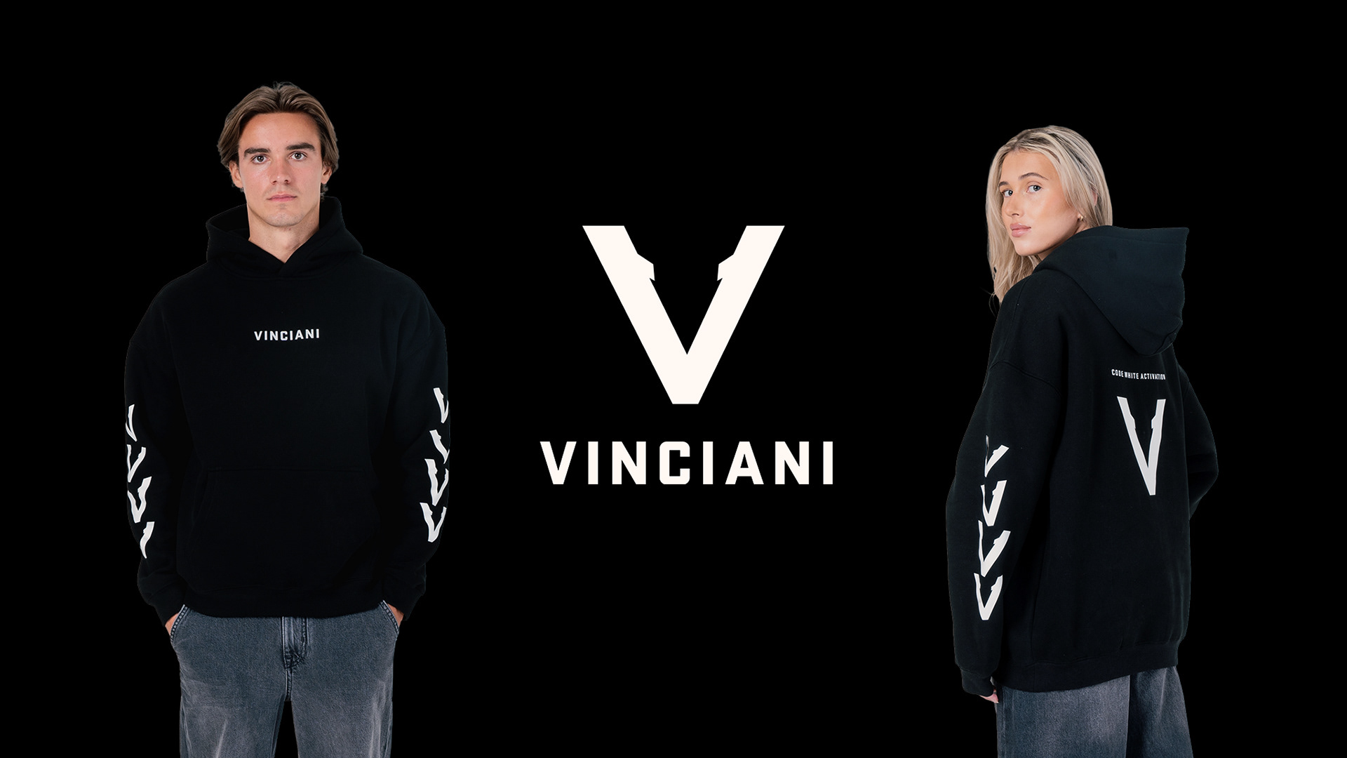 VINCIANI campaign artwork by Vibe Ink Studios featuring male and female models in black Code White Activation hoodies, with the VINCIANI V-Mark and wordmark centred on a black background.