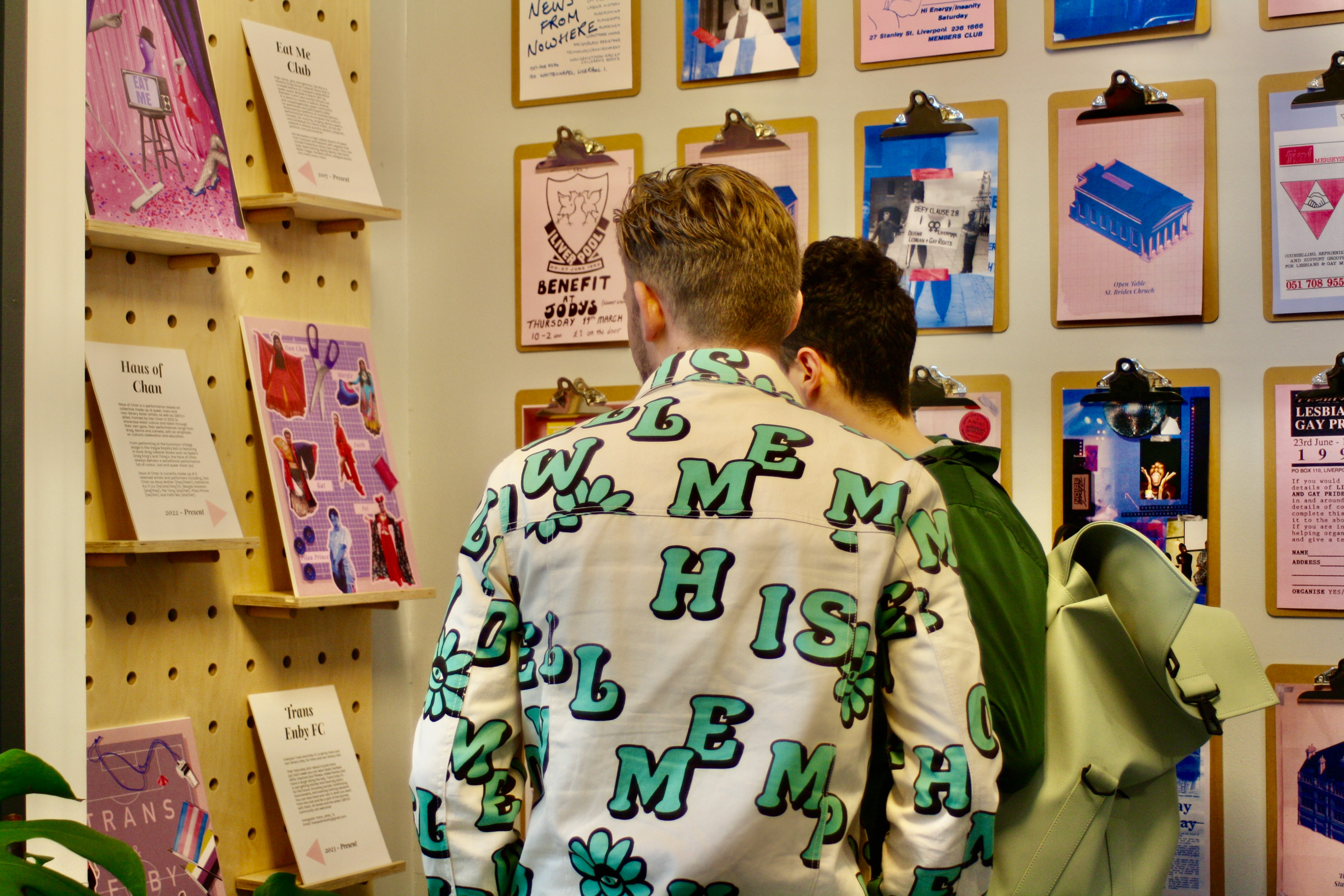 A couple looking at the exhibition