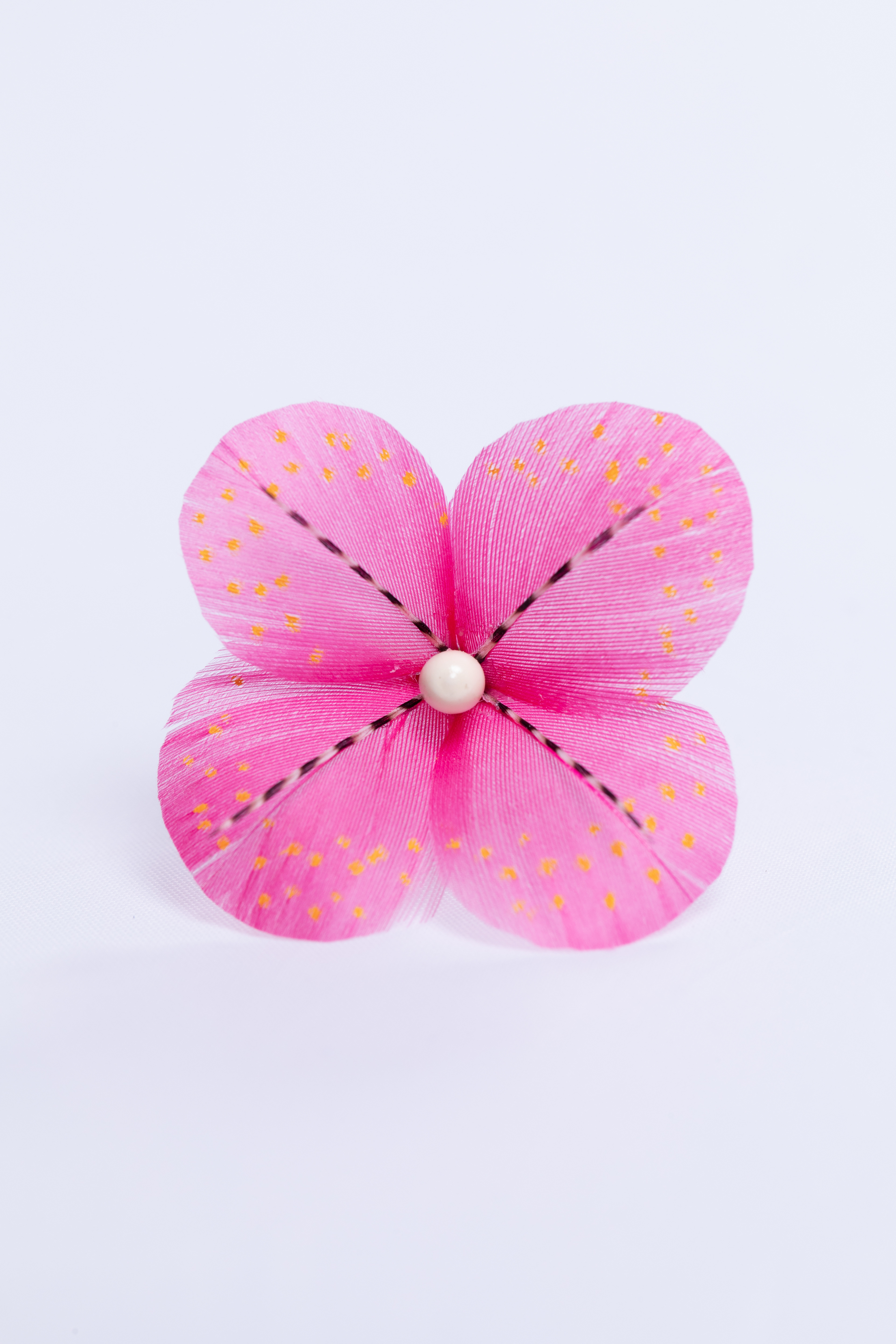 Marie Piron - P'Plumes création de bijoux à base de plumes et de matières naturelles.