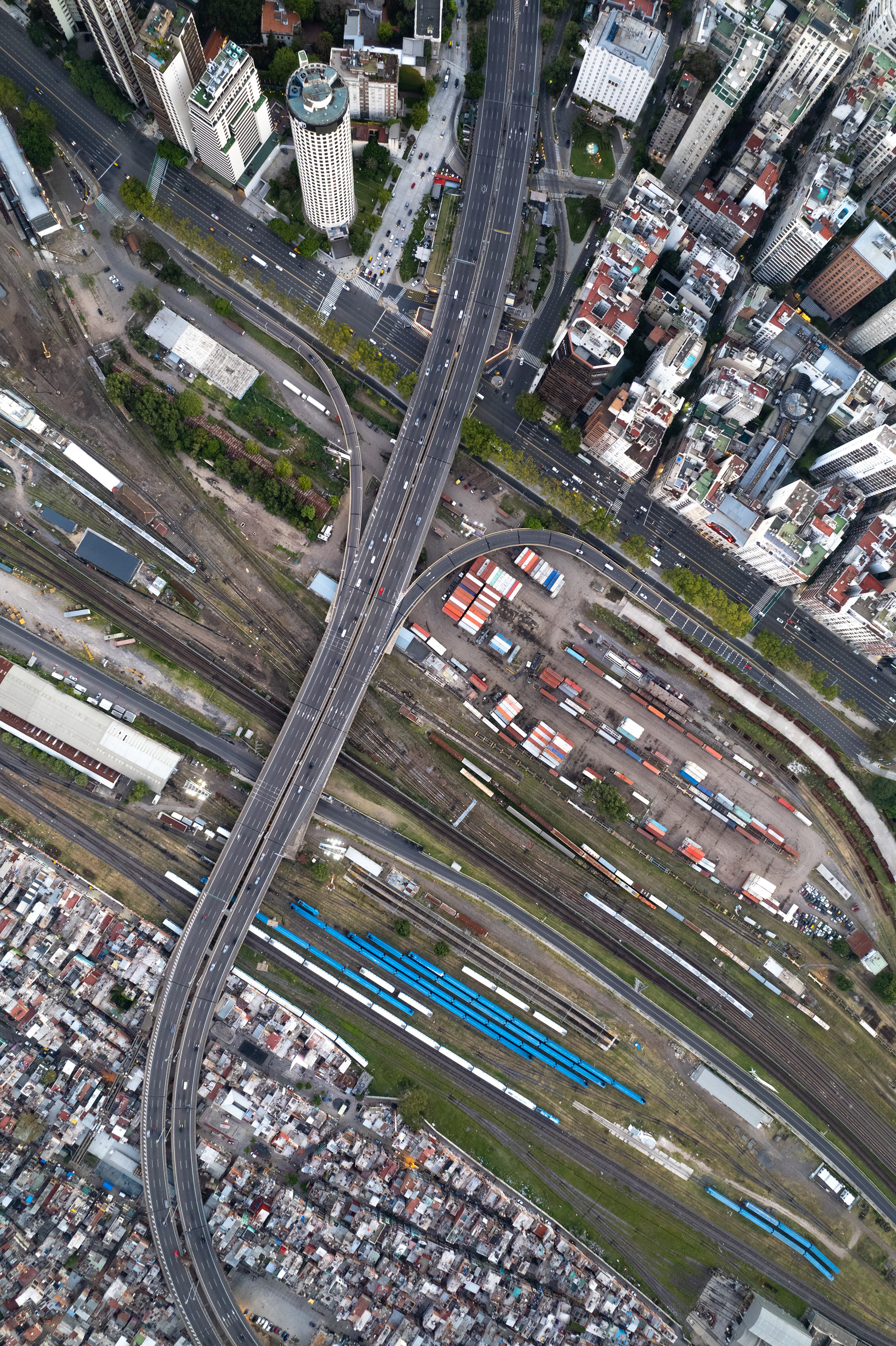 Drone image of train tracks separating rich and poor neighborhoods in Buenos Aires, Argentina.