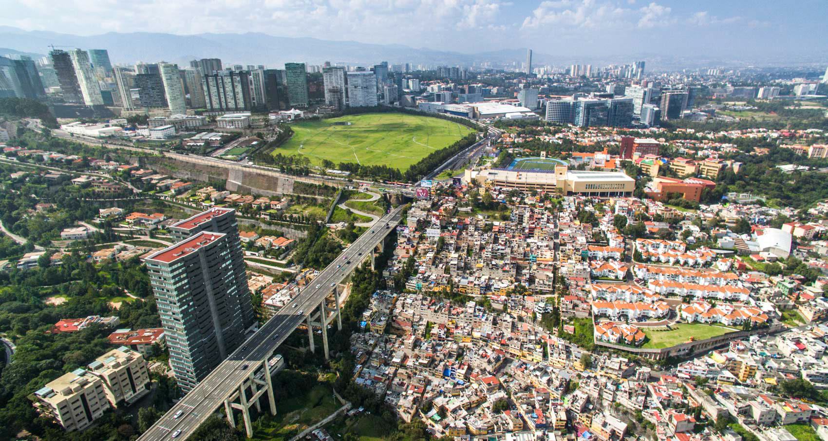 highway and slums in mexico city