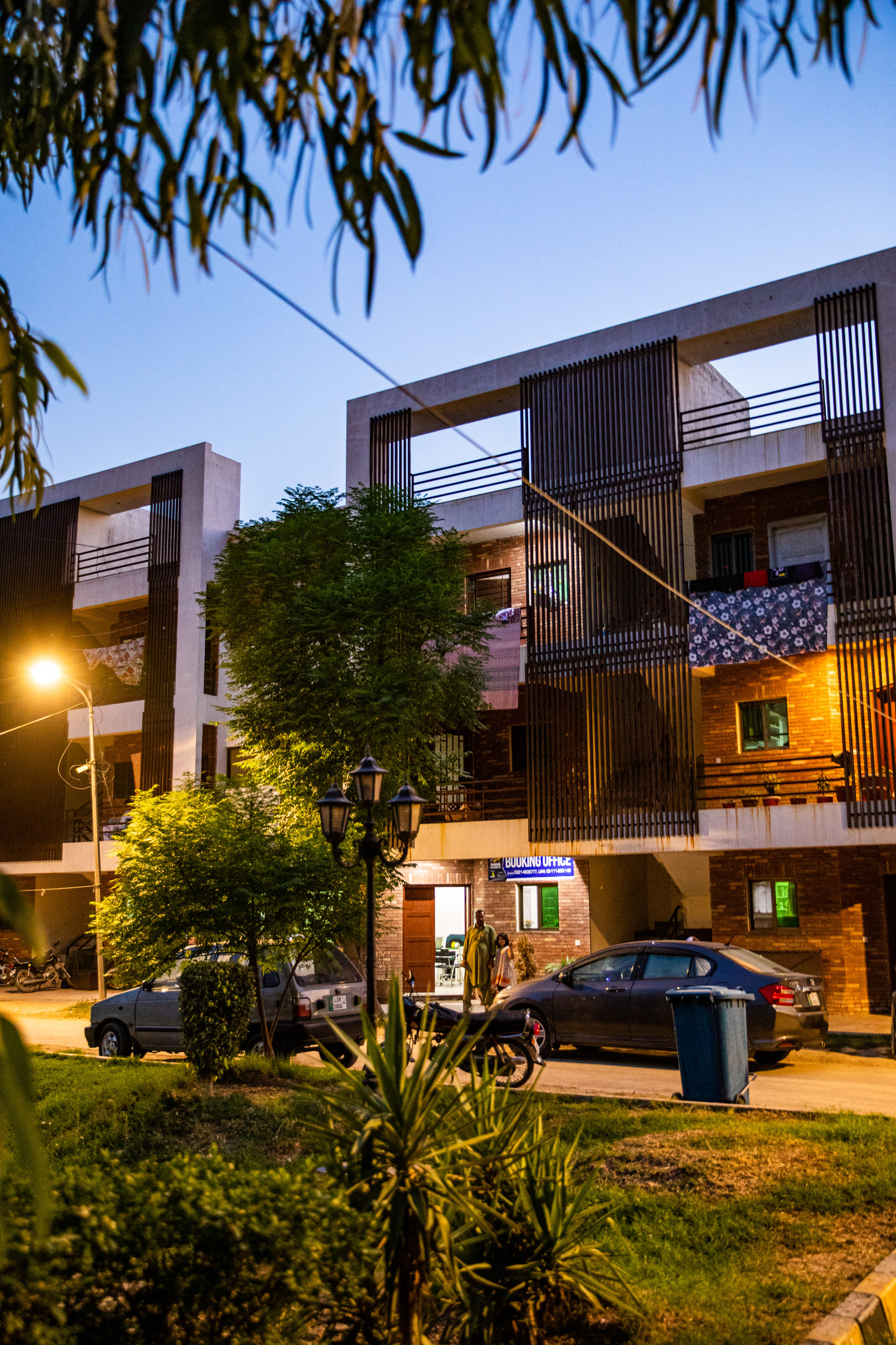 A photo at dusk of a modern family home.