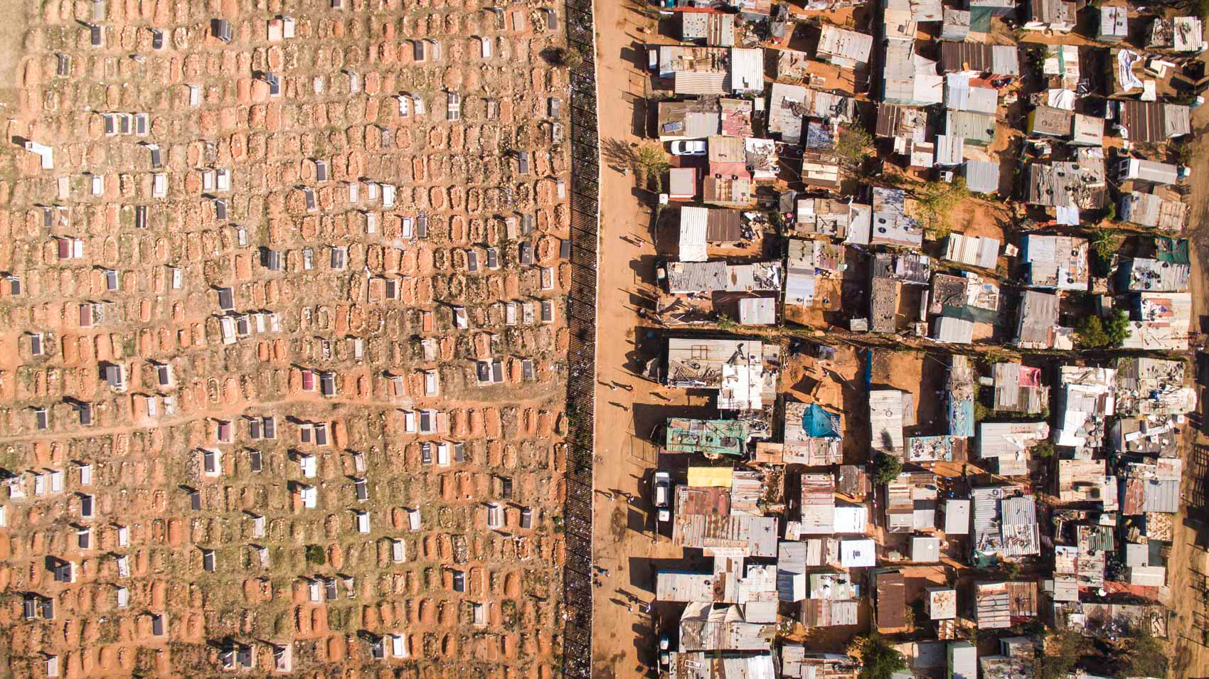 aerial view of cemetery and shacks in johannesburg, south africa
