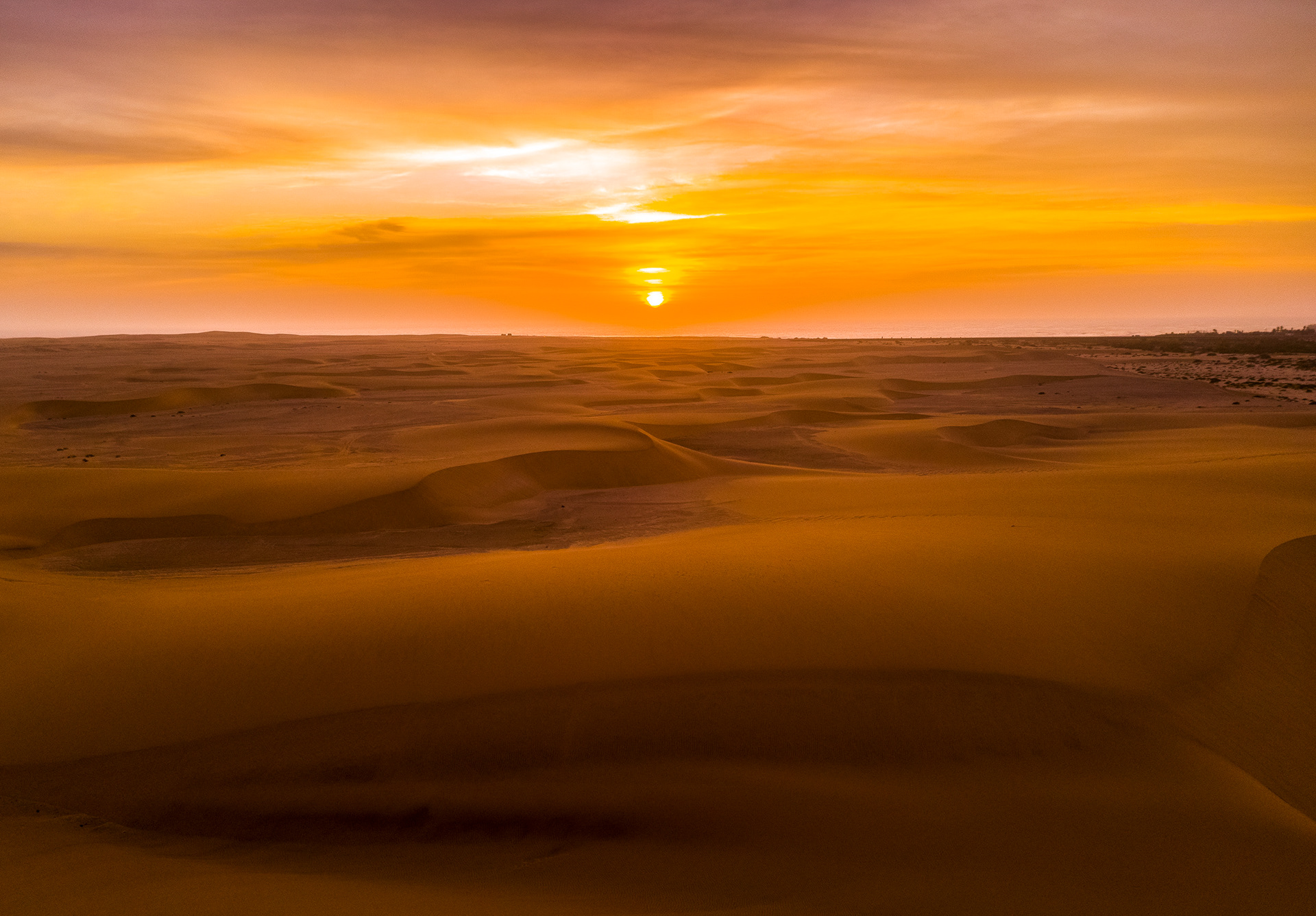 aerial view of the sand dunes at sunset in swakopmund