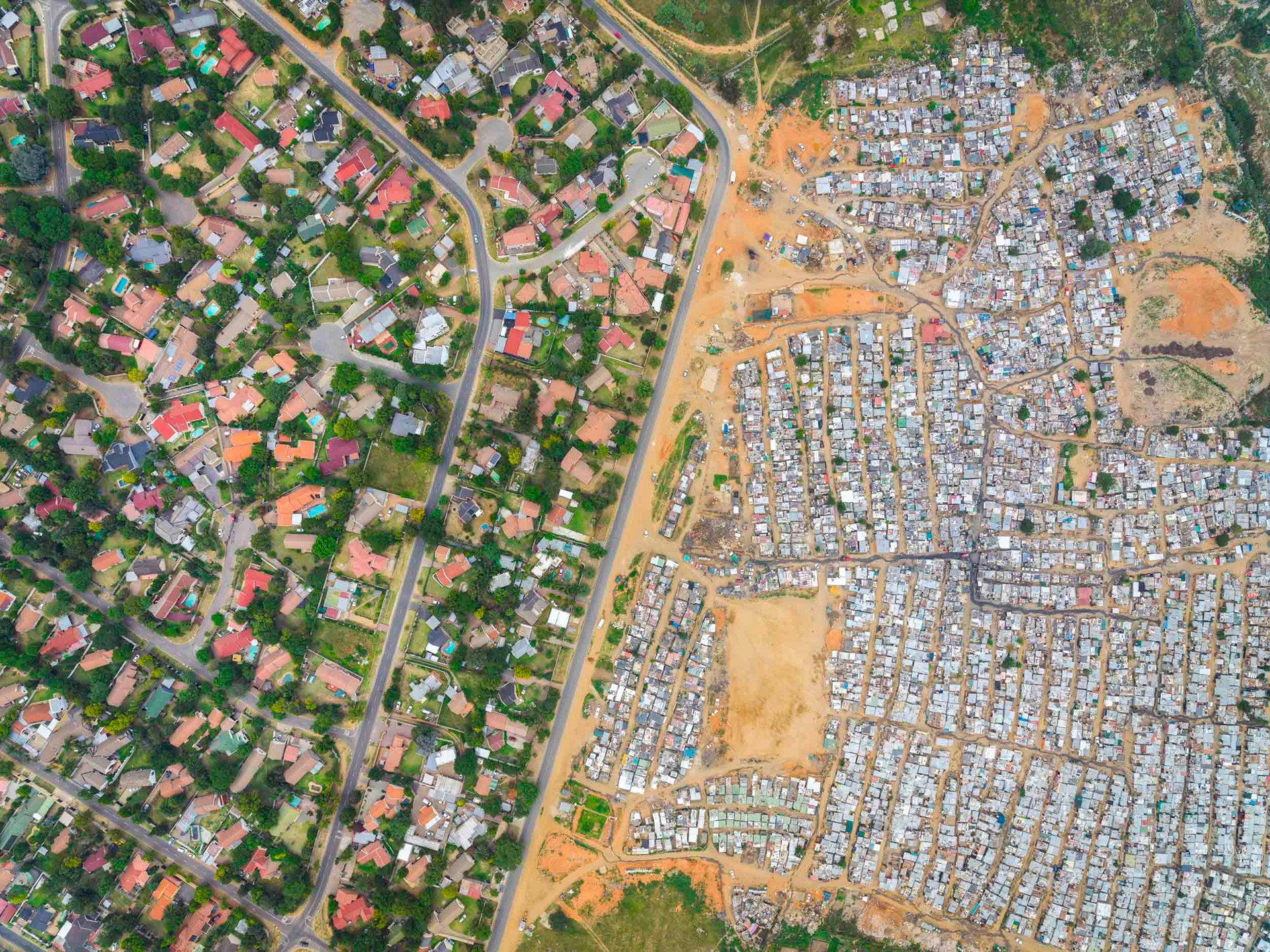 aerial image of slums and wealthy homes in johannesburg