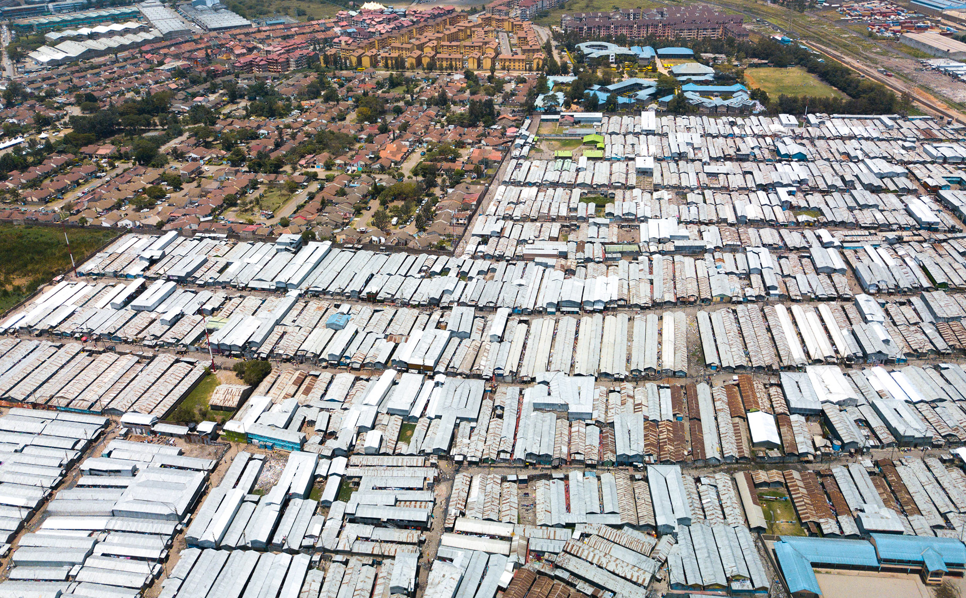 orderly homes next to a large slum in nairobi