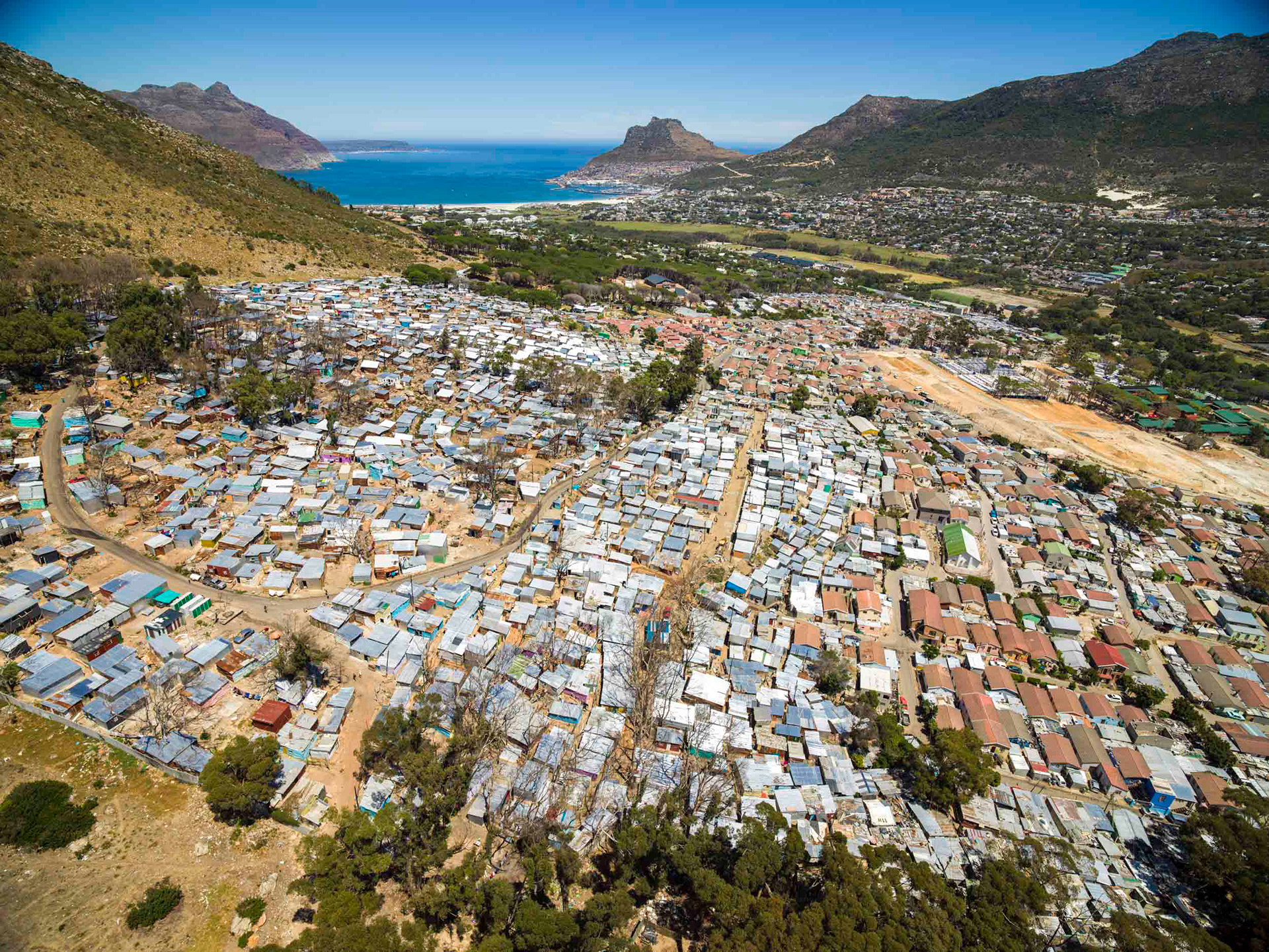 drone view of wealthy and slums in cape town south africa