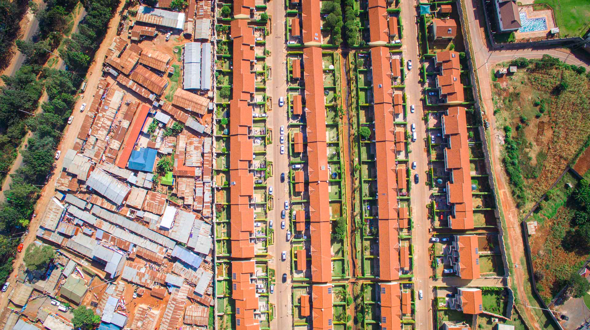 orange houses with green yards and orange slums in nairobi