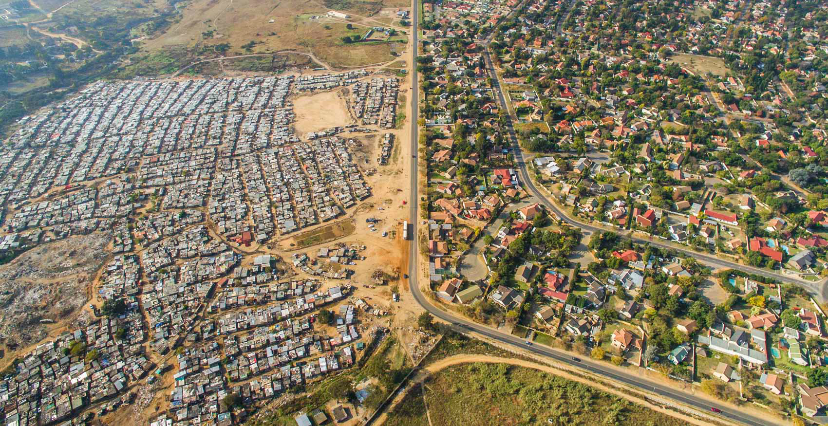 aerial image of slums and wealthy homes in johannesburg