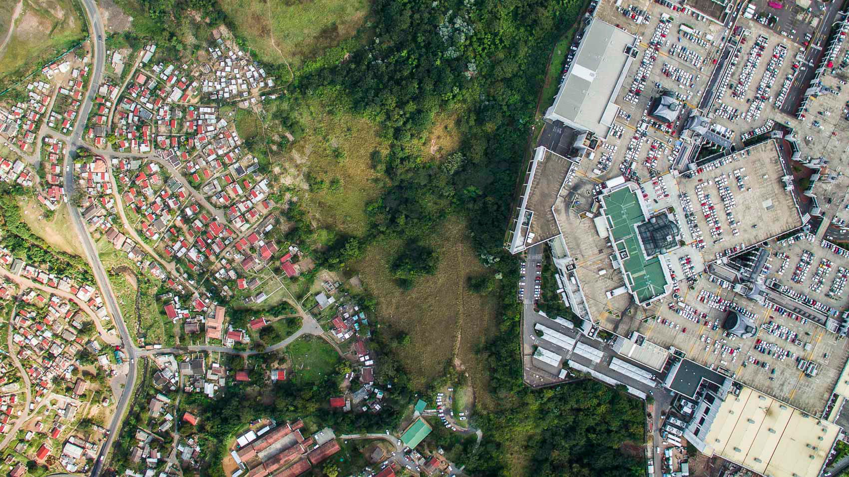 aerial view of shacks and shopping mall in durban
