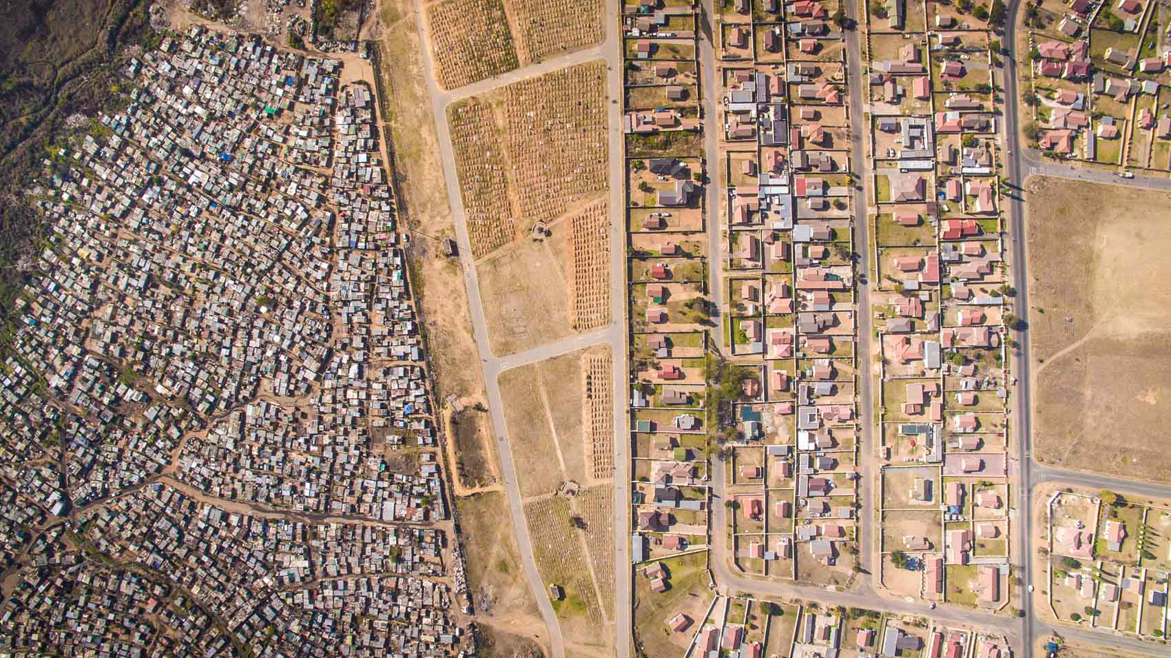 aerial view of cemetery and shacks in johannesburg, south africa