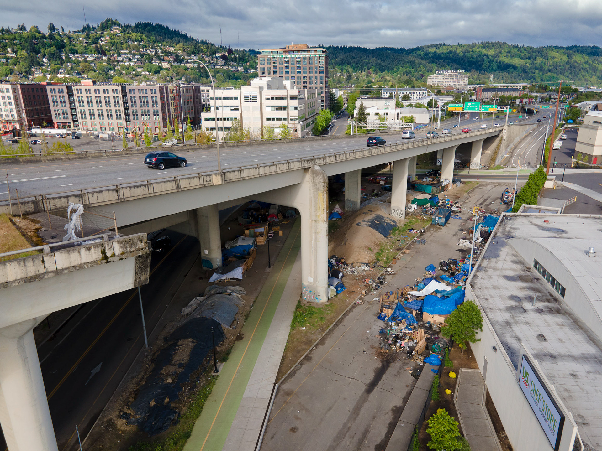 aerial view of a homeless camp under a bridge in portland