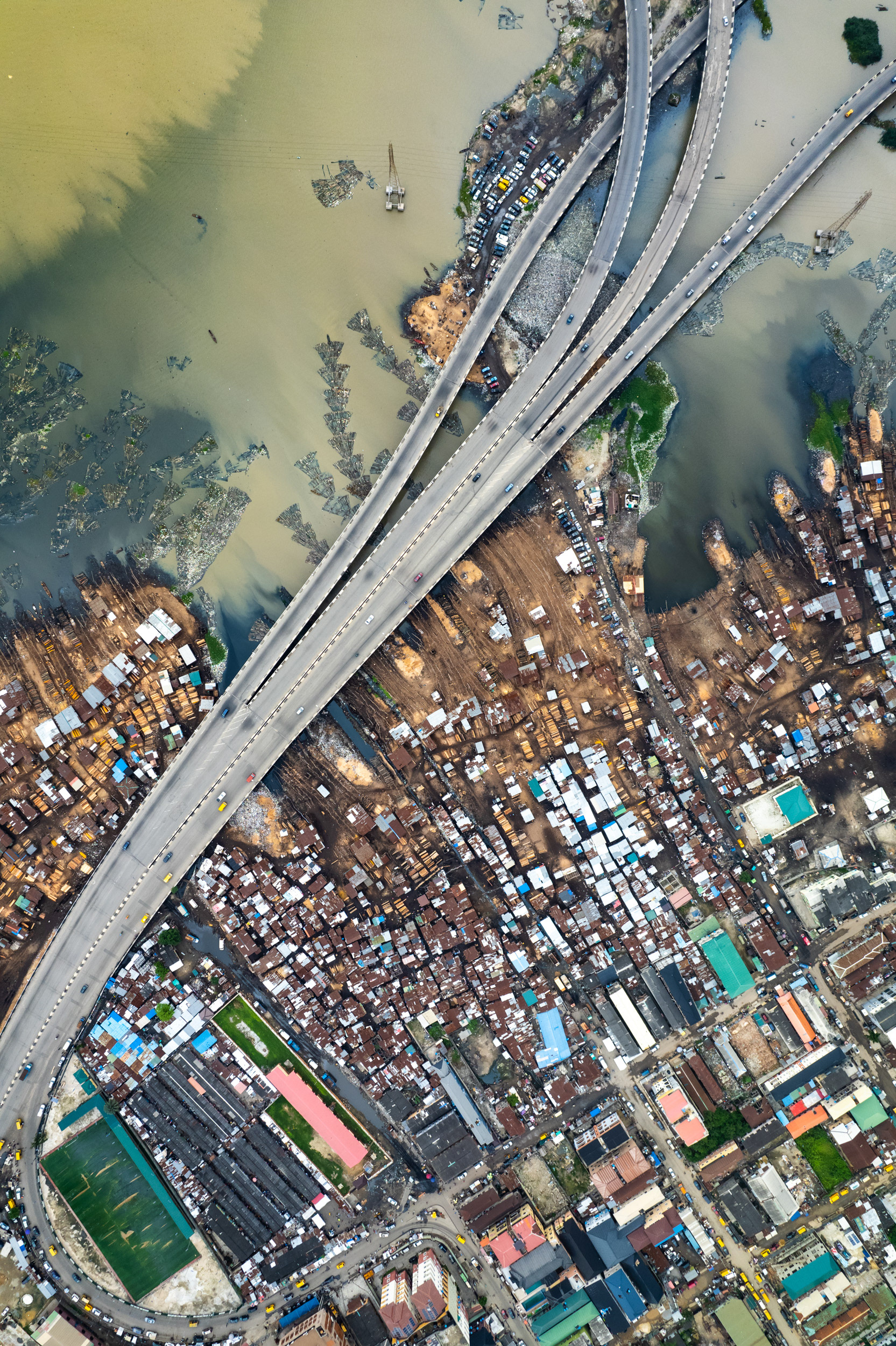 An aerial view of a bridge and a slum in Lagos.