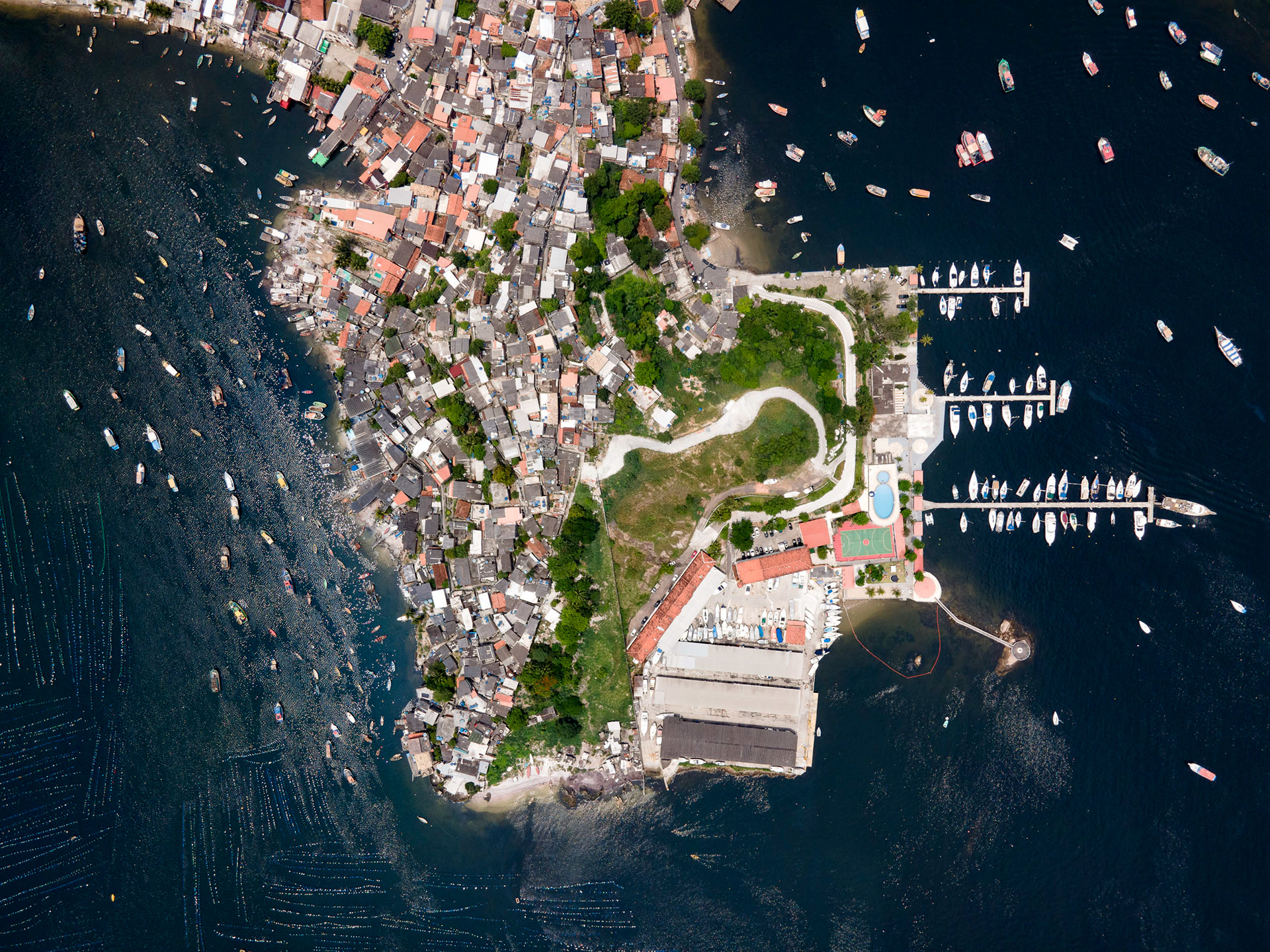 Yacht club next to a favela, Niteroi, Brazil.