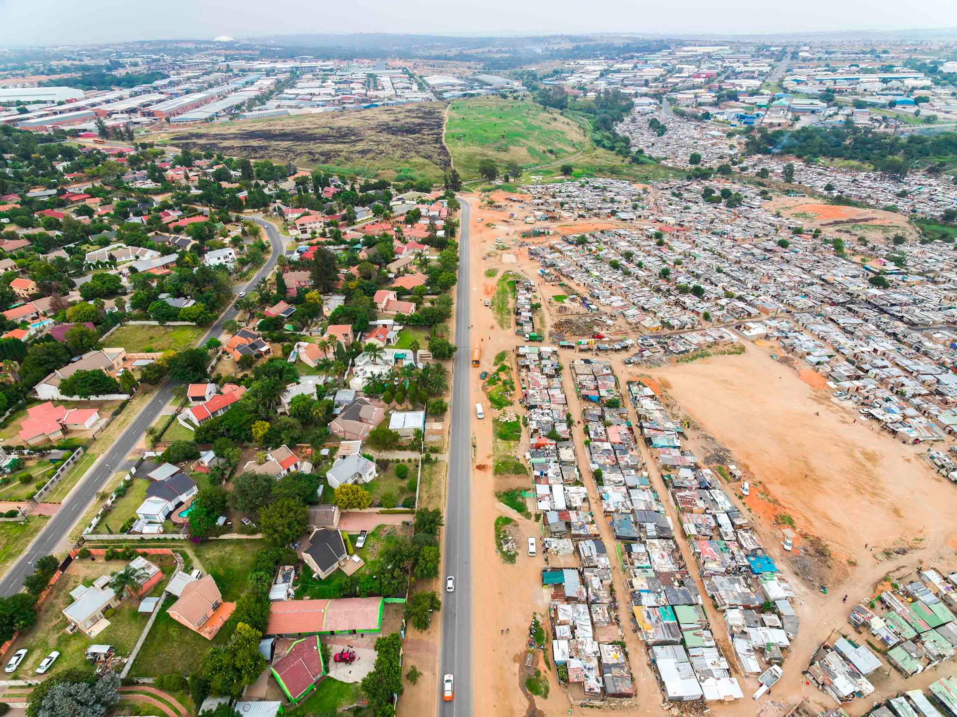 aerial image of slums and wealthy homes in johannesburg